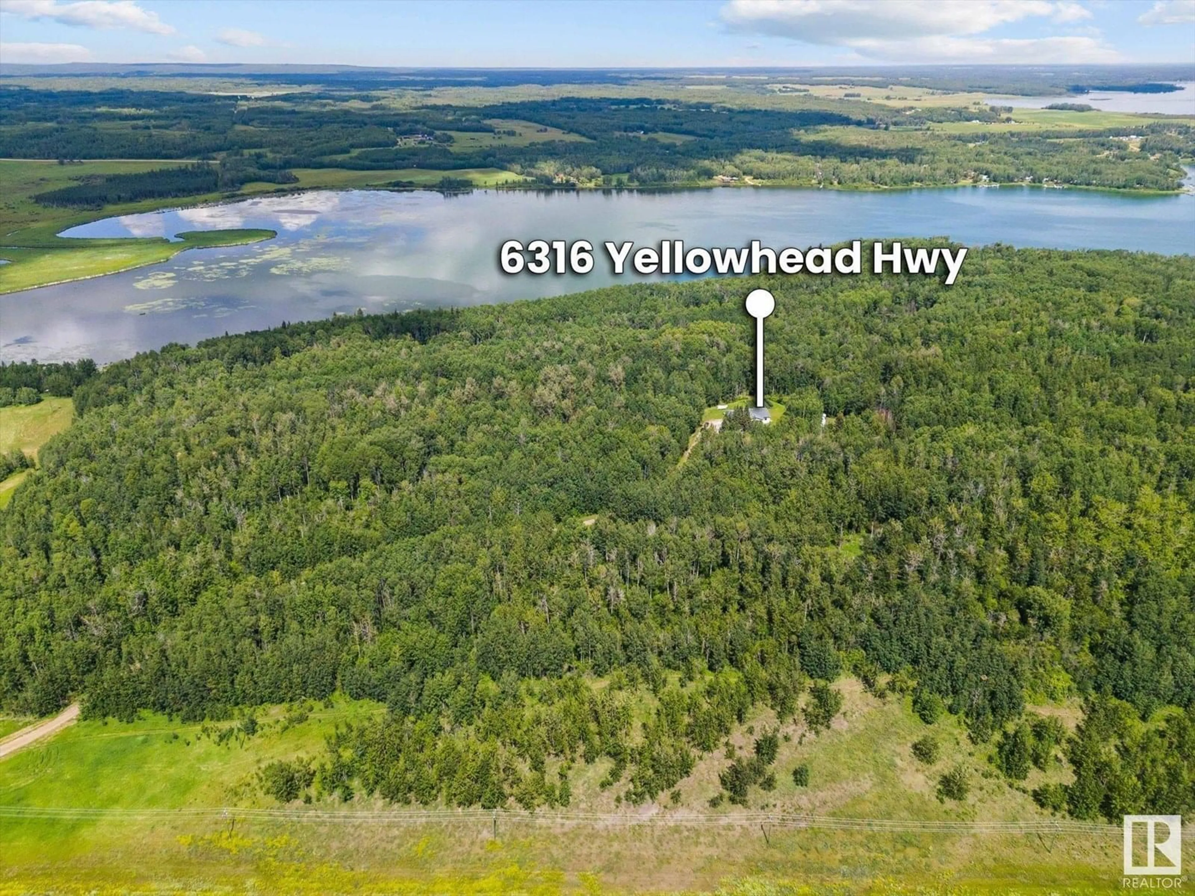 A pic from outside/outdoor area/front of a property/back of a property/a pic from drone, forest/trees view for 6316 HGHWAY 16, Rural Parkland County Alberta T0E0W0