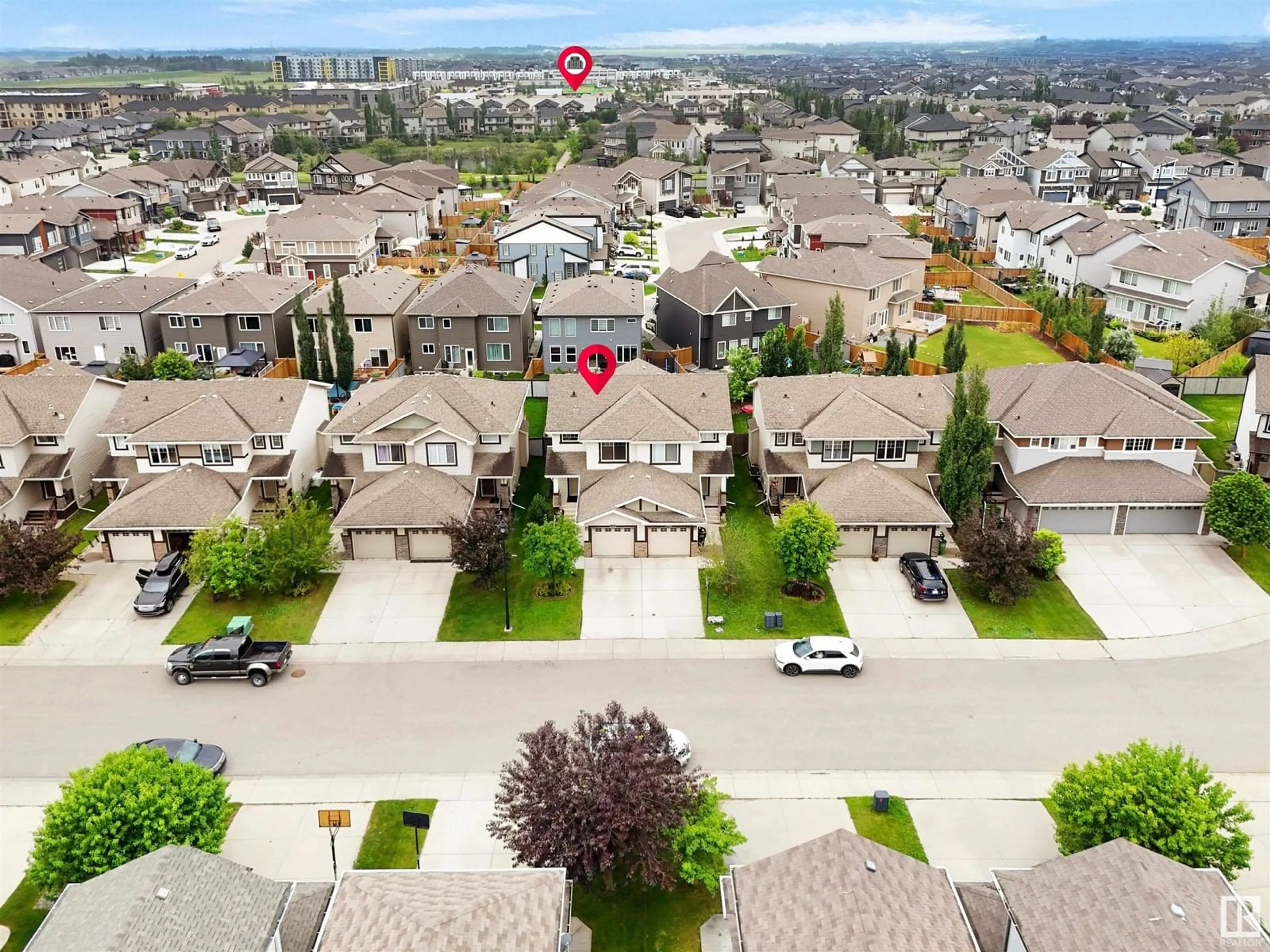 A pic from outside/outdoor area/front of a property/back of a property/a pic from drone, unknown for 17361 8A AV SW, Edmonton Alberta T6W0M8