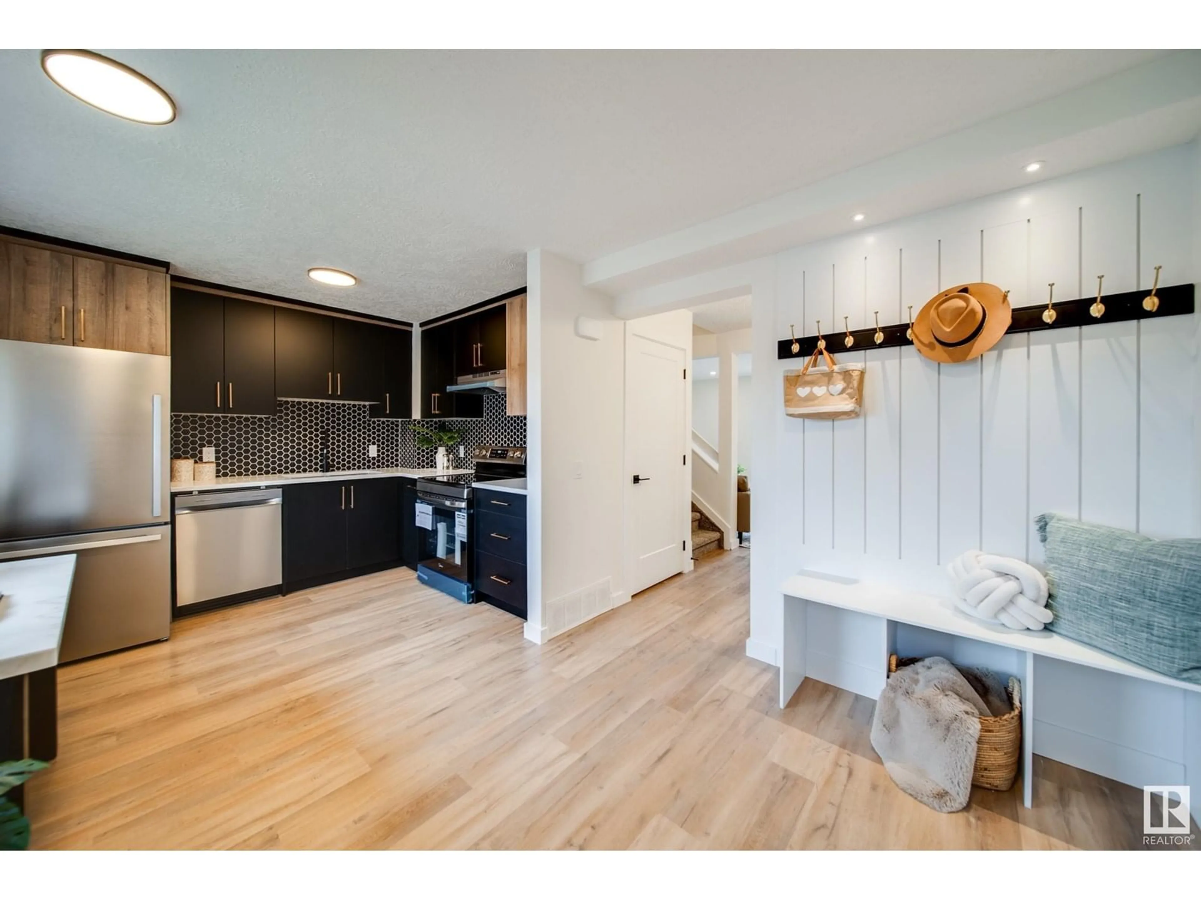 Open concept kitchen, wood/laminate floor for 117 WOODBOROUGH WY, Edmonton Alberta T5Y1N2