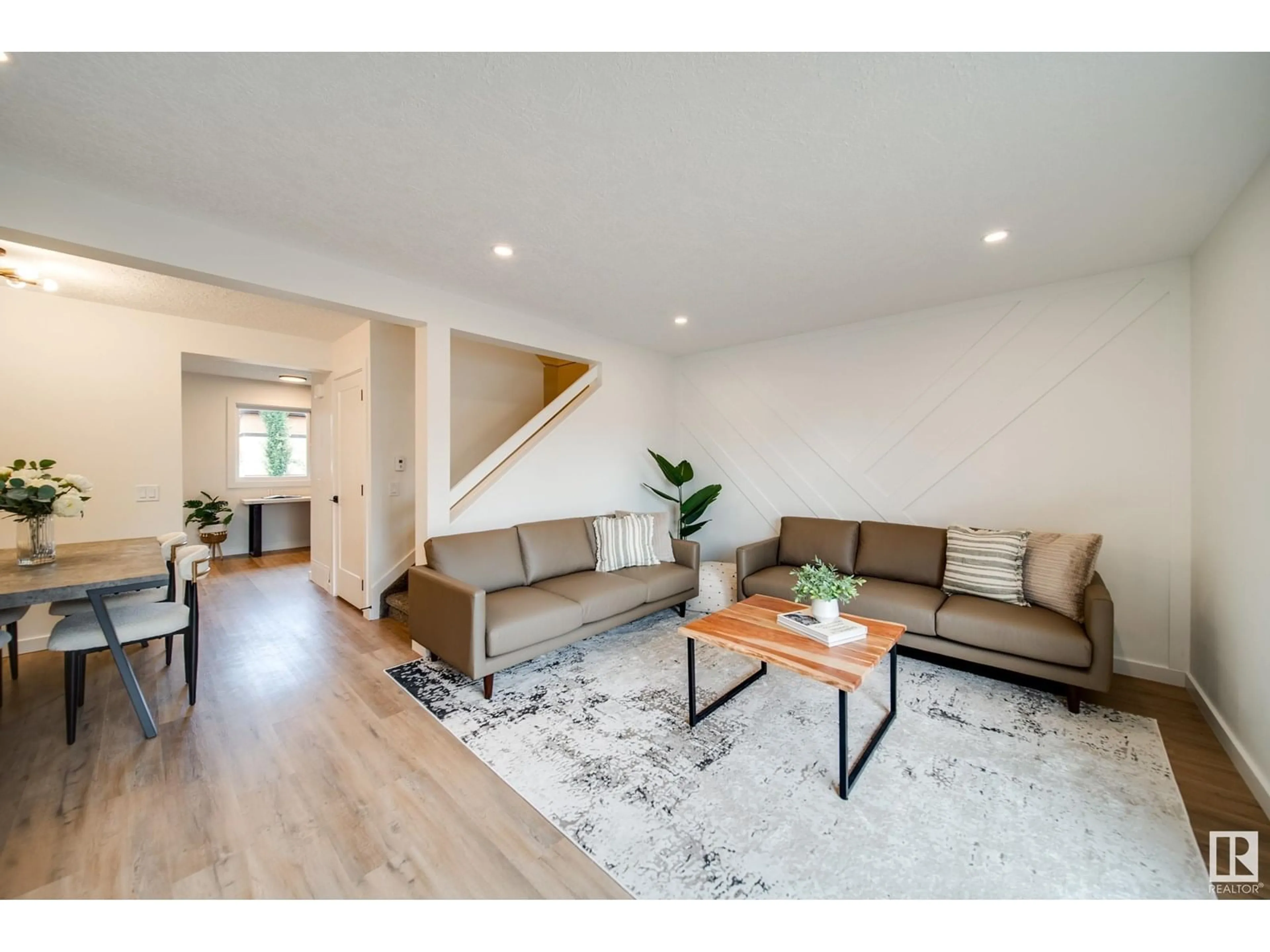 Living room with furniture, wood/laminate floor for 117 WOODBOROUGH WY, Edmonton Alberta T5Y1N2