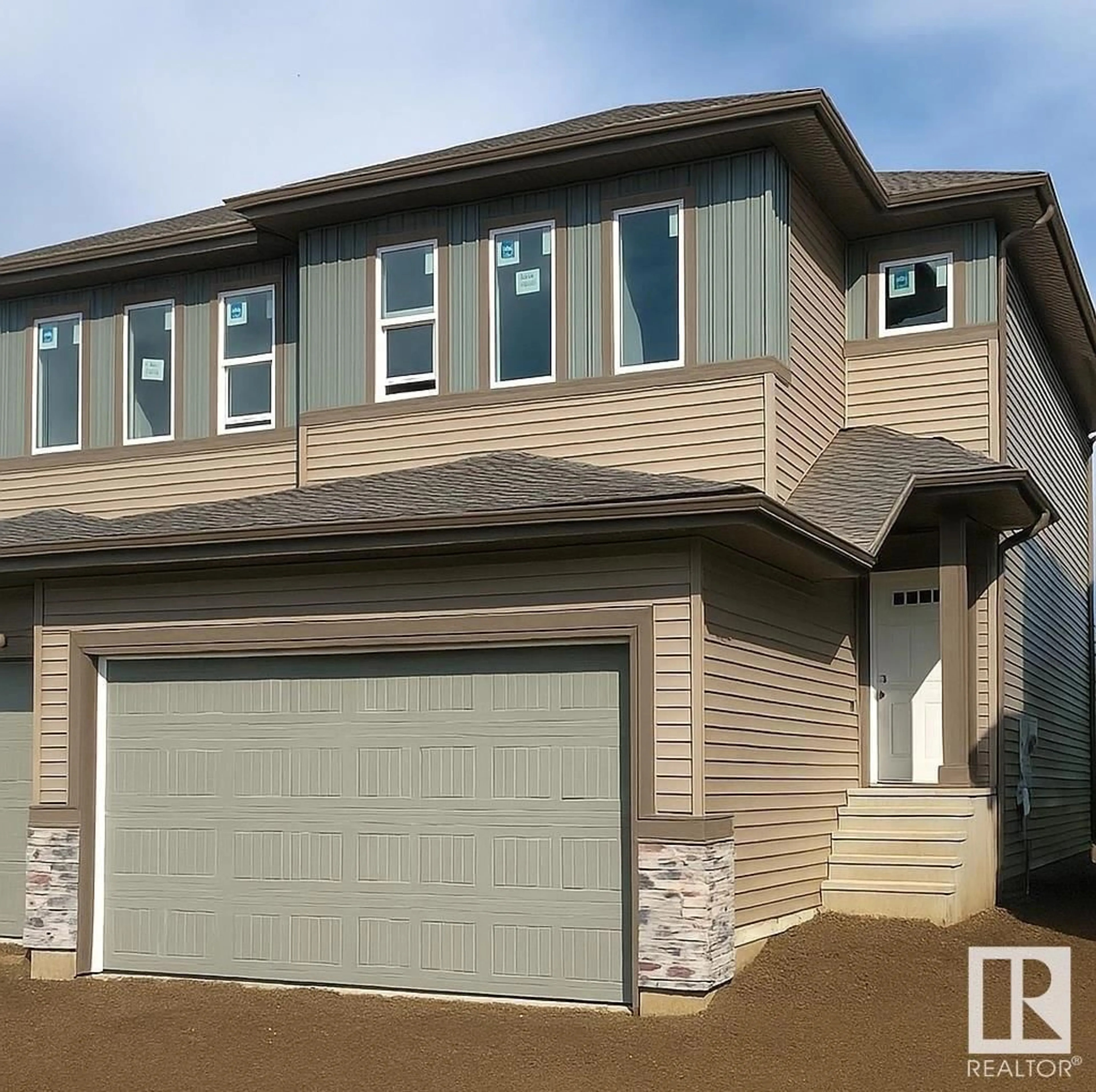 Home with vinyl exterior material, street for 133 HILTON CV, Spruce Grove Alberta T7X1Y4