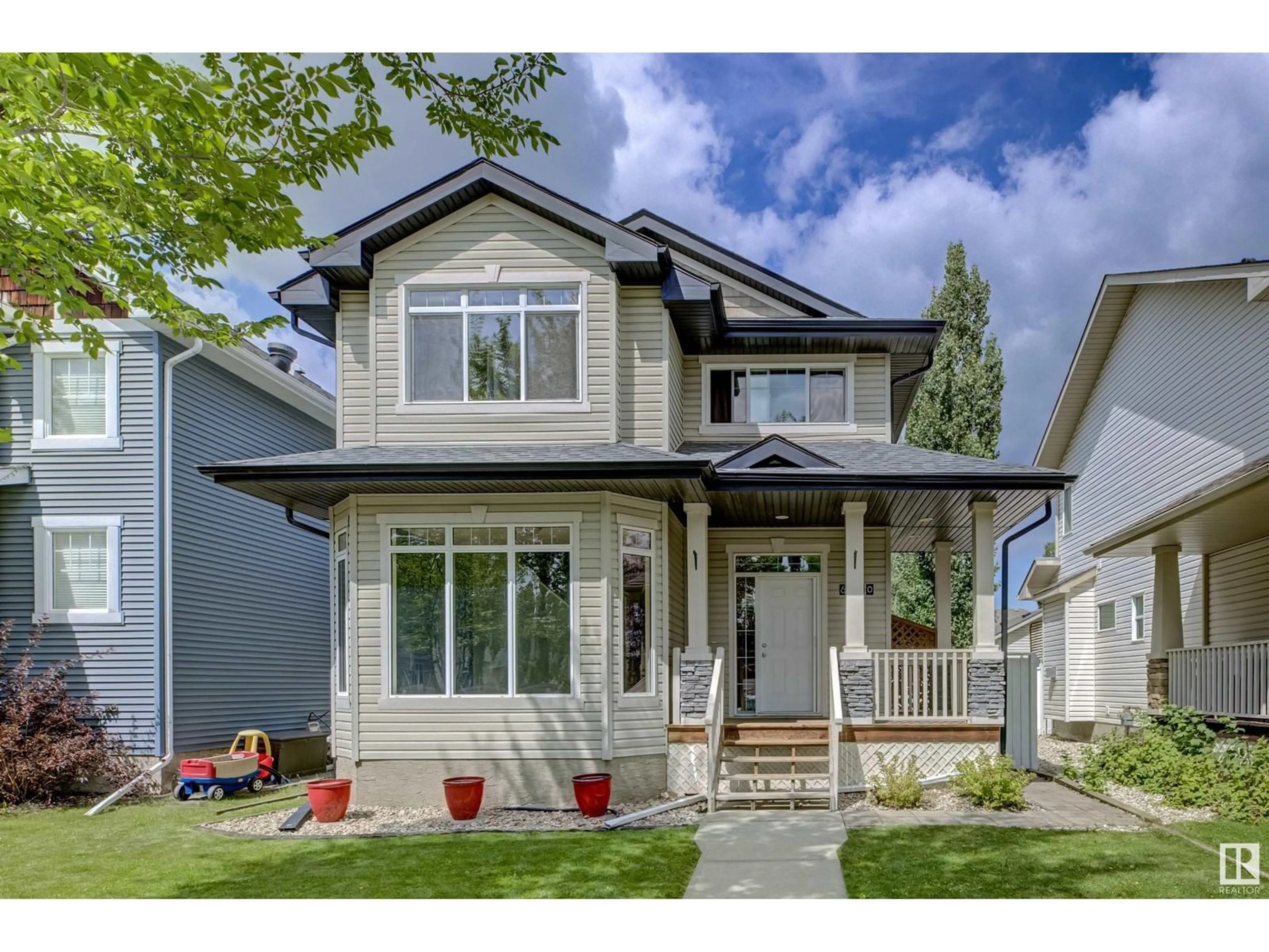 Home with vinyl exterior material, street for 6150 STINSON WY, Edmonton Alberta T6R0K3