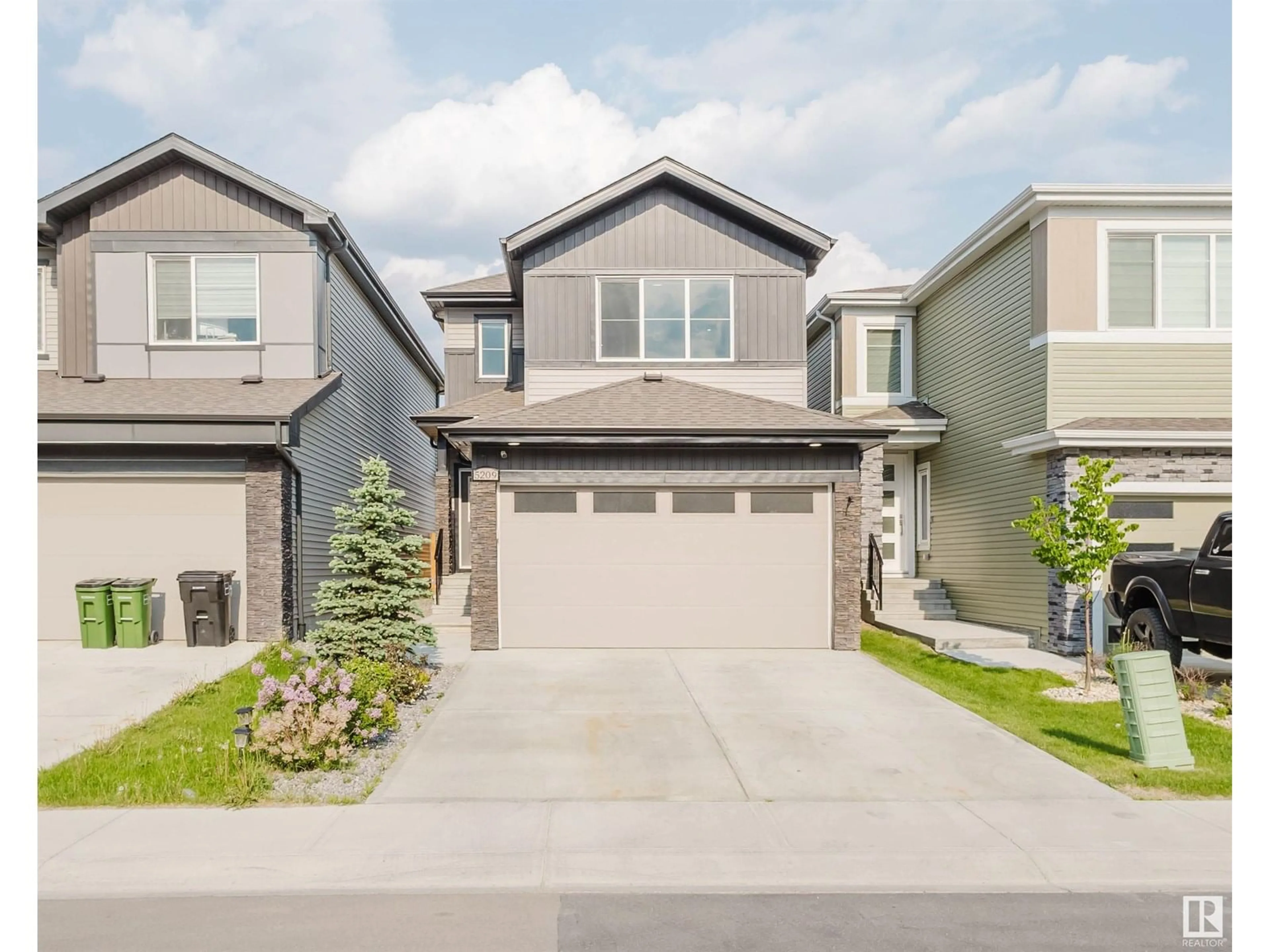 Home with vinyl exterior material, street for 5209 KIMBALL CRES, Edmonton Alberta T6W4Z2