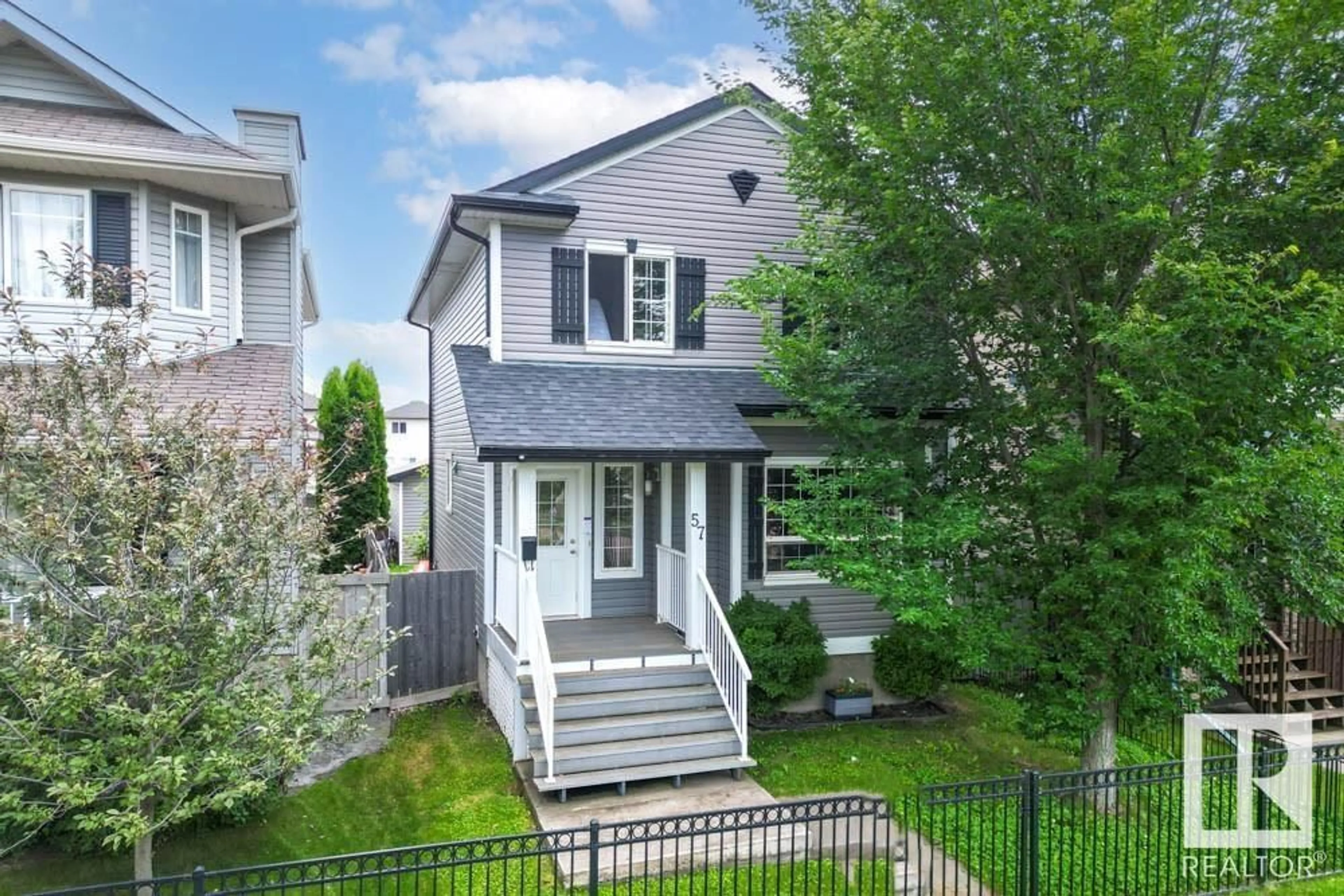A pic from outside/outdoor area/front of a property/back of a property/a pic from drone, street for PM - 57 SUNTREE, Leduc Alberta T9E8R8