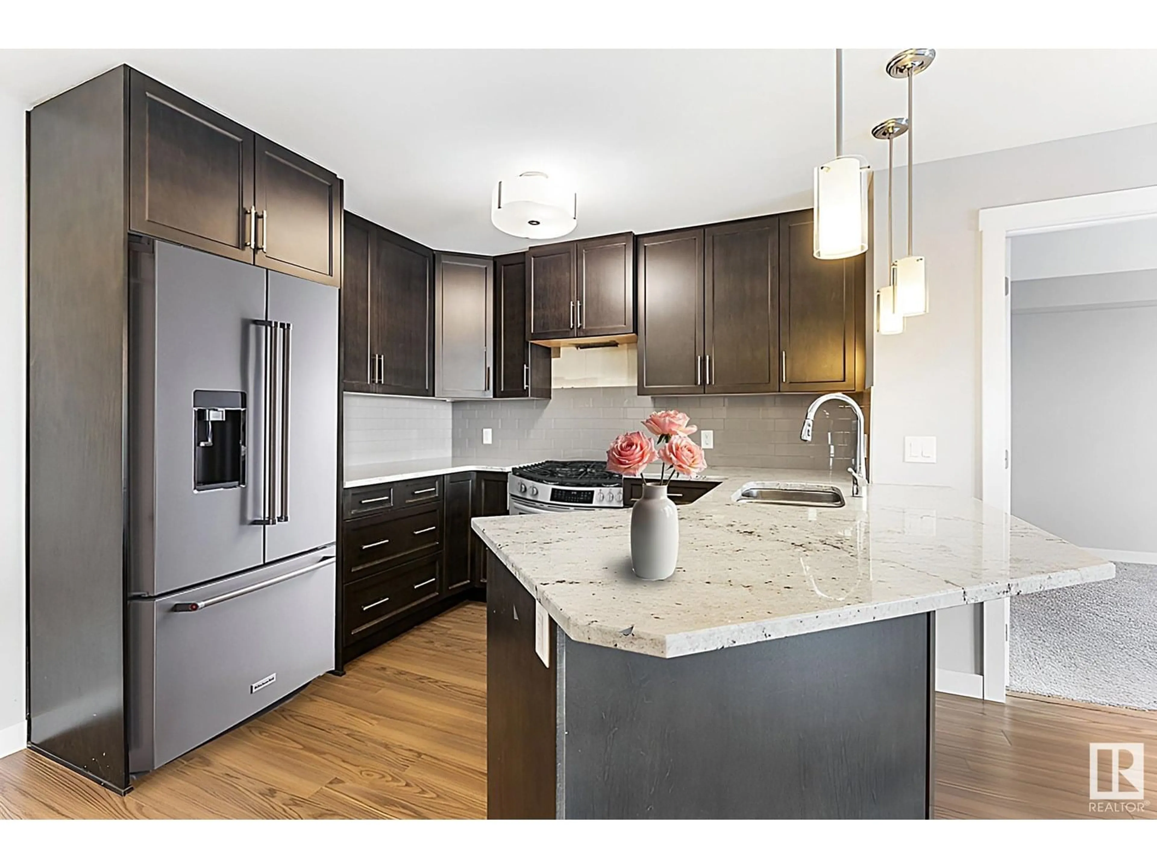 Open concept kitchen, wood/laminate floor for #303 - 2229 44 AV NW, Edmonton Alberta T5T0W6