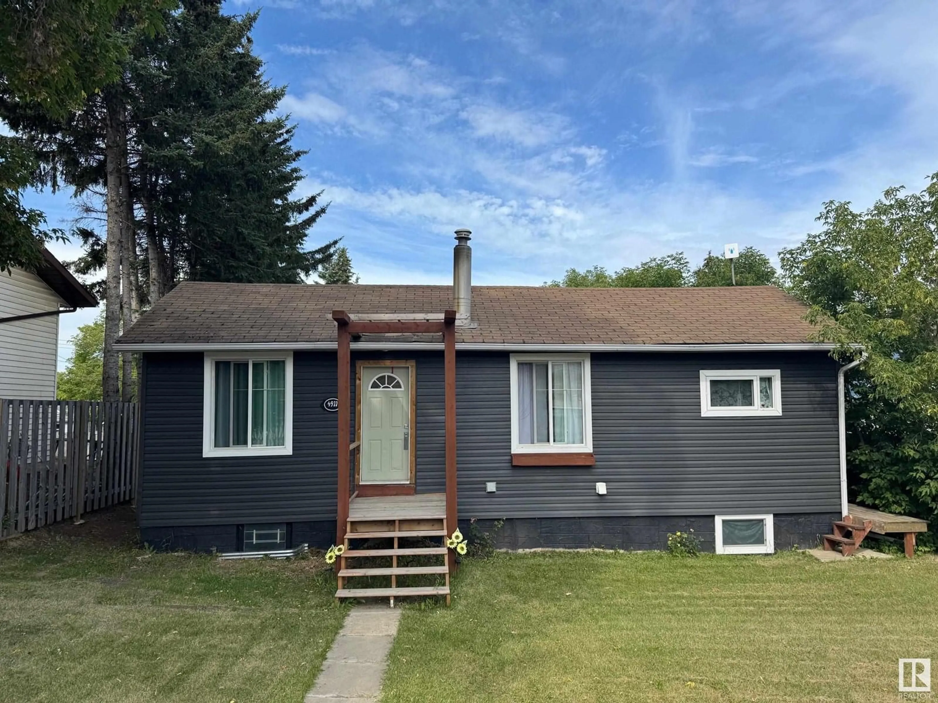 Home with vinyl exterior material, street for 4911 42 ST, Athabasca Town Alberta T9S1P7