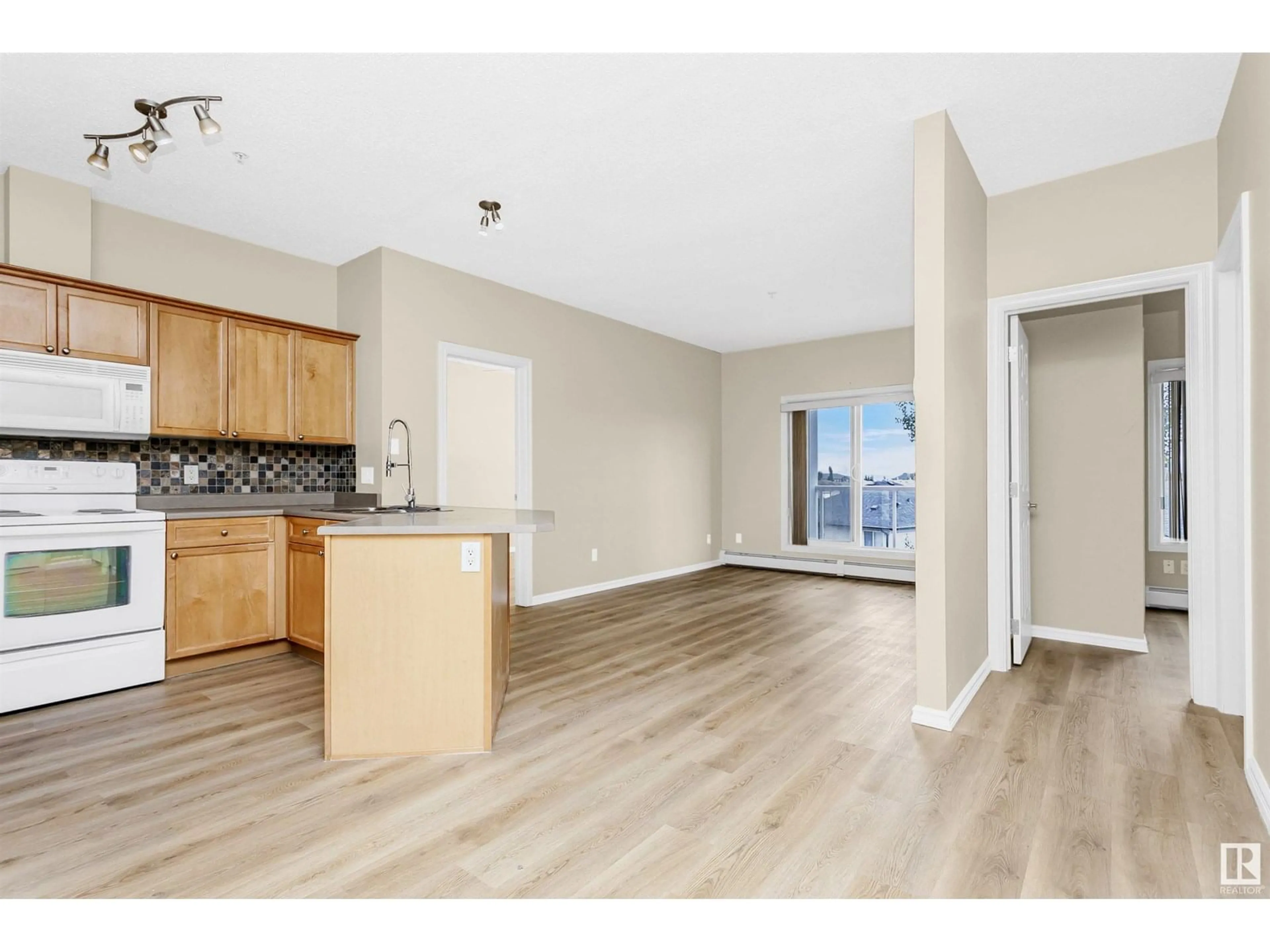 Open concept kitchen, unknown for 226 - 315 MACEWAN RD, Edmonton Alberta T6W0C5