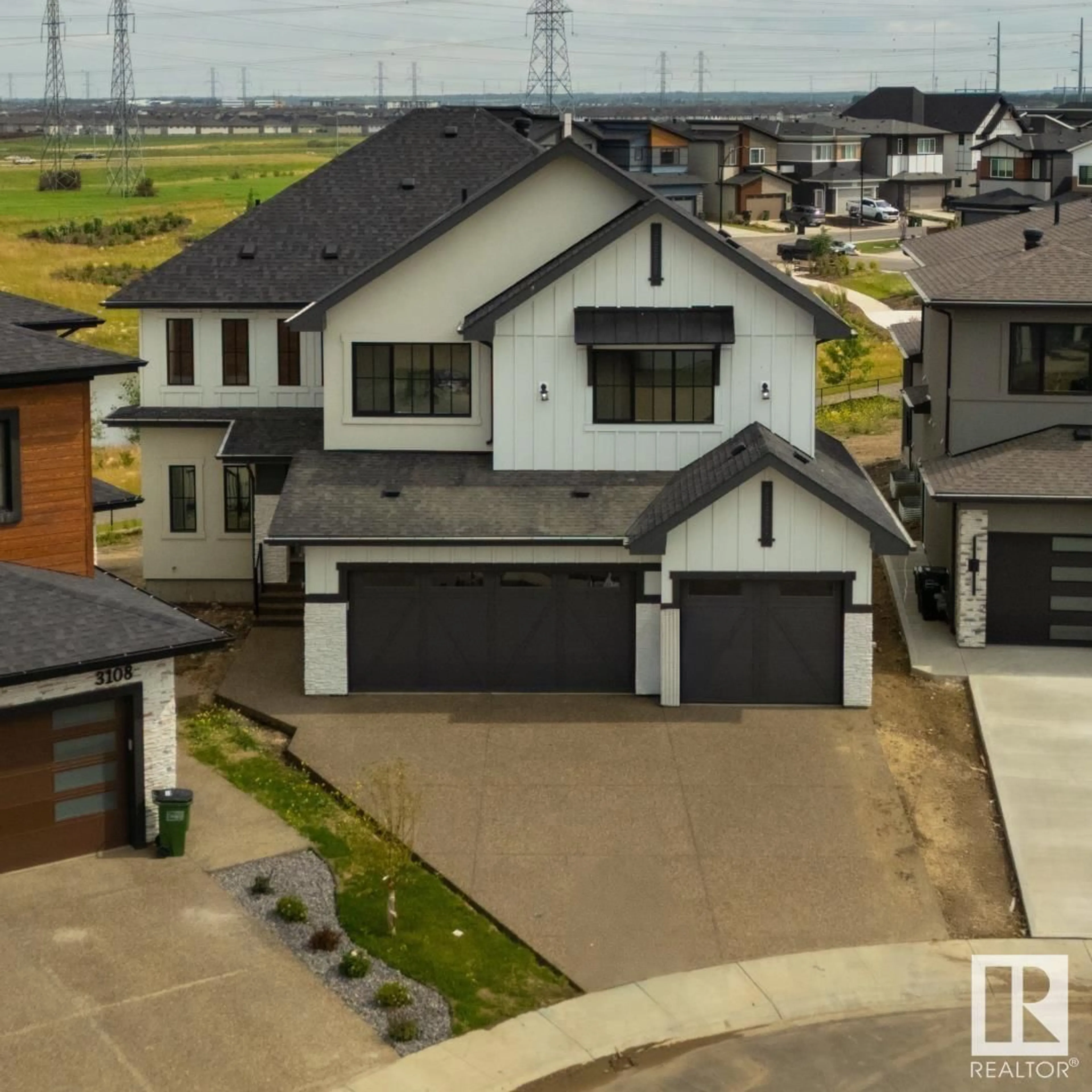 A pic from outside/outdoor area/front of a property/back of a property/a pic from drone, street for SW - 3104 2 AVE AV, Edmonton Alberta T6X3C7