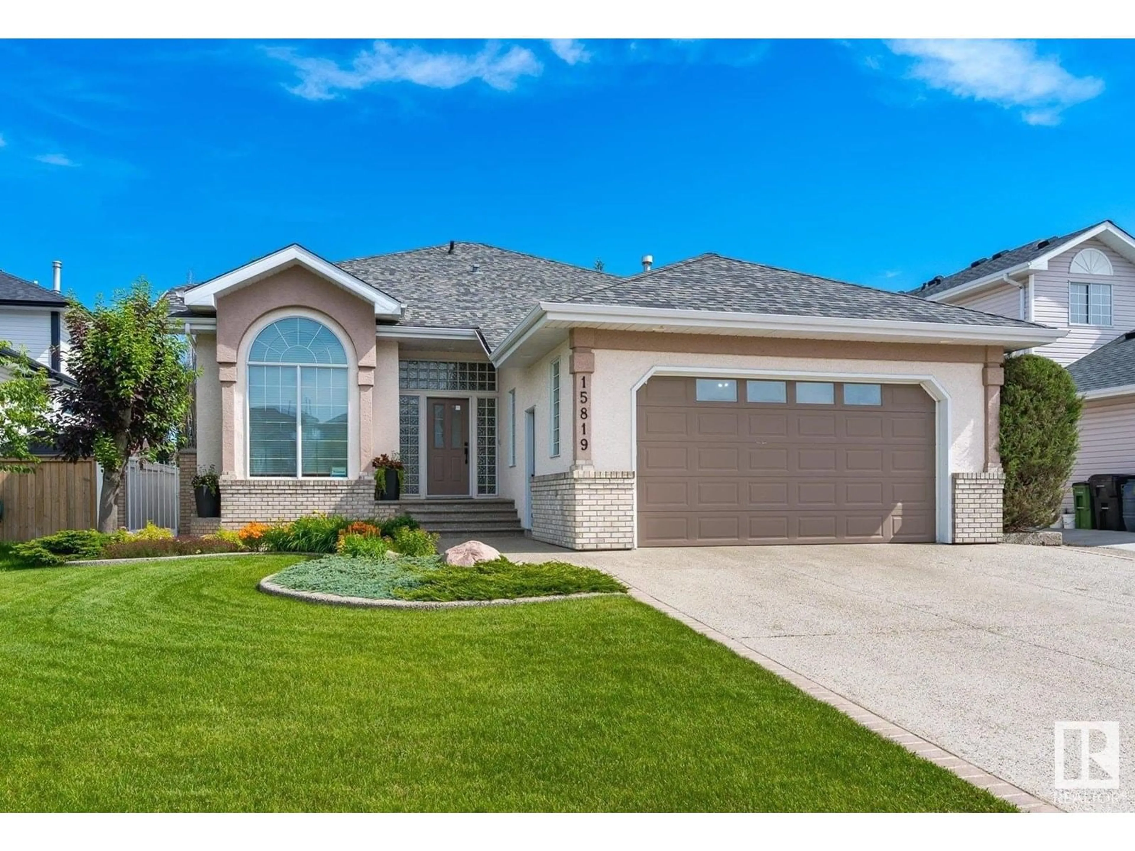Home with vinyl exterior material, street for 15819 63 ST, Edmonton Alberta T5Y2R8