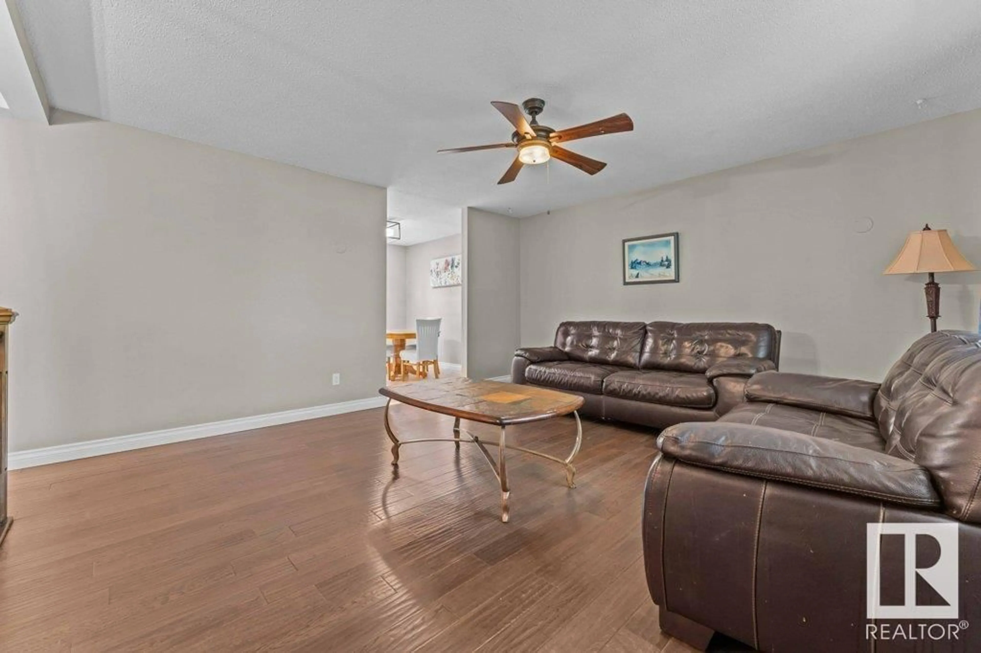 Living room with furniture, wood/laminate floor for 60 MENLO CR, Sherwood Park Alberta T8A0R9