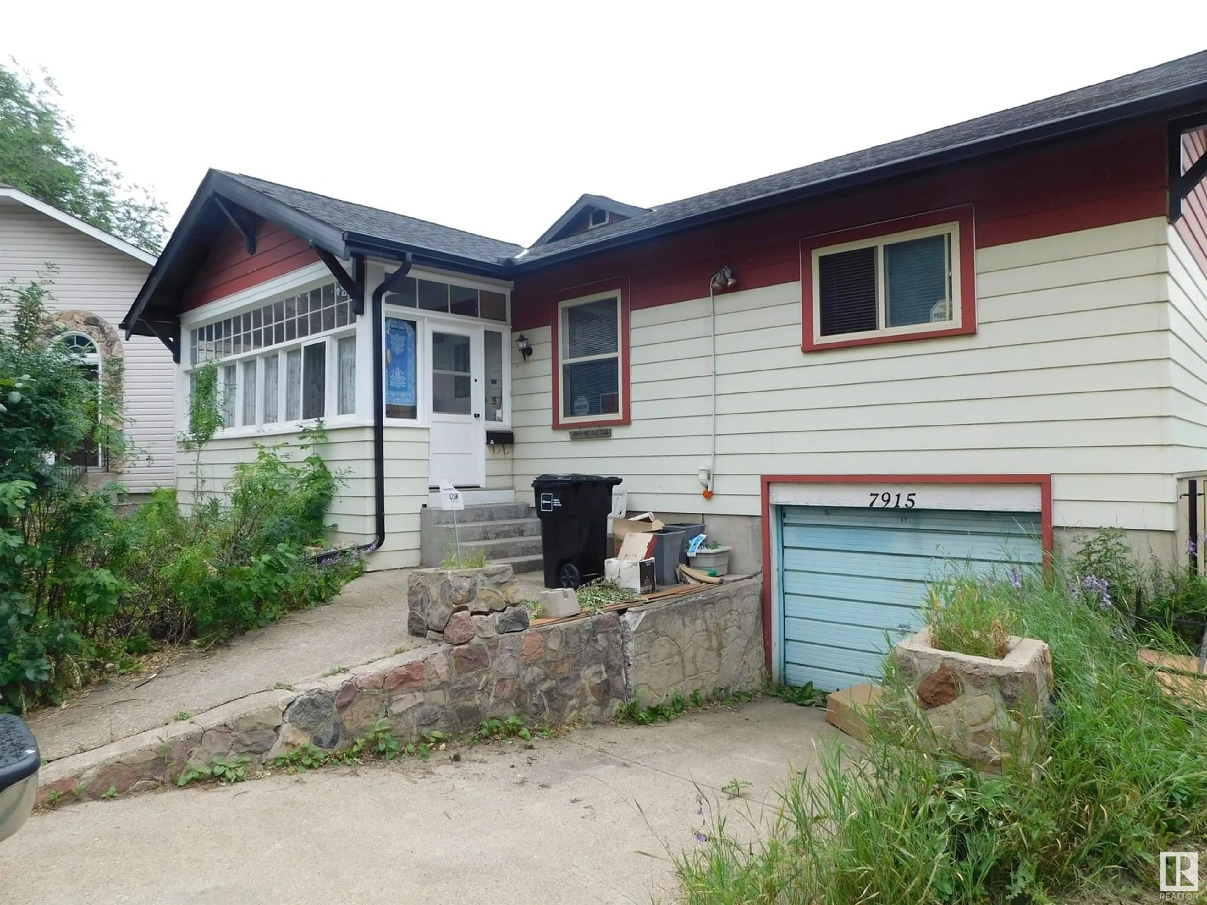 Home with vinyl exterior material, street for NW - 7915 112S AV, Edmonton Alberta T5B0H6