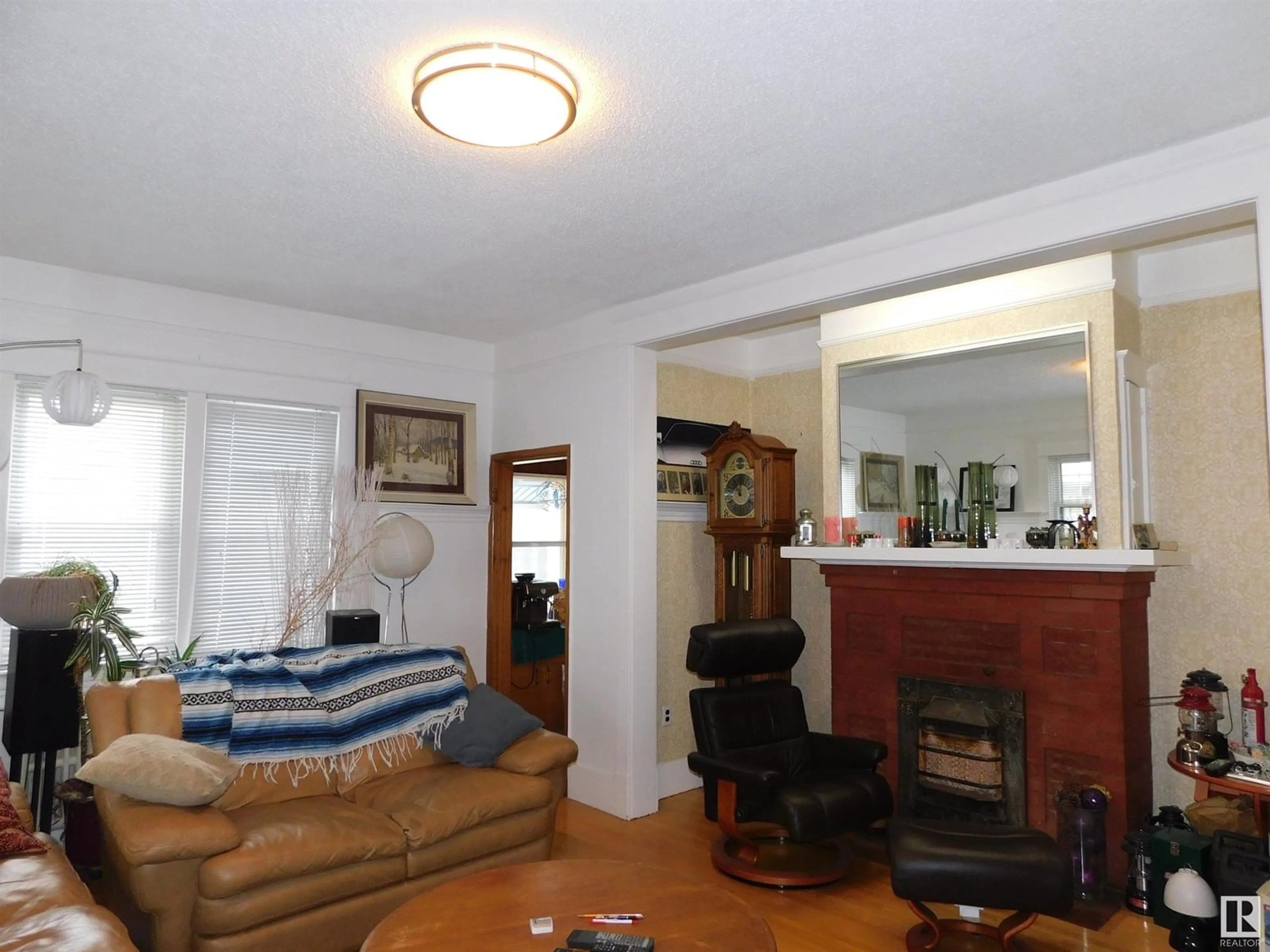 Living room with furniture, unknown for NW - 7915 112S AV, Edmonton Alberta T5B0H6
