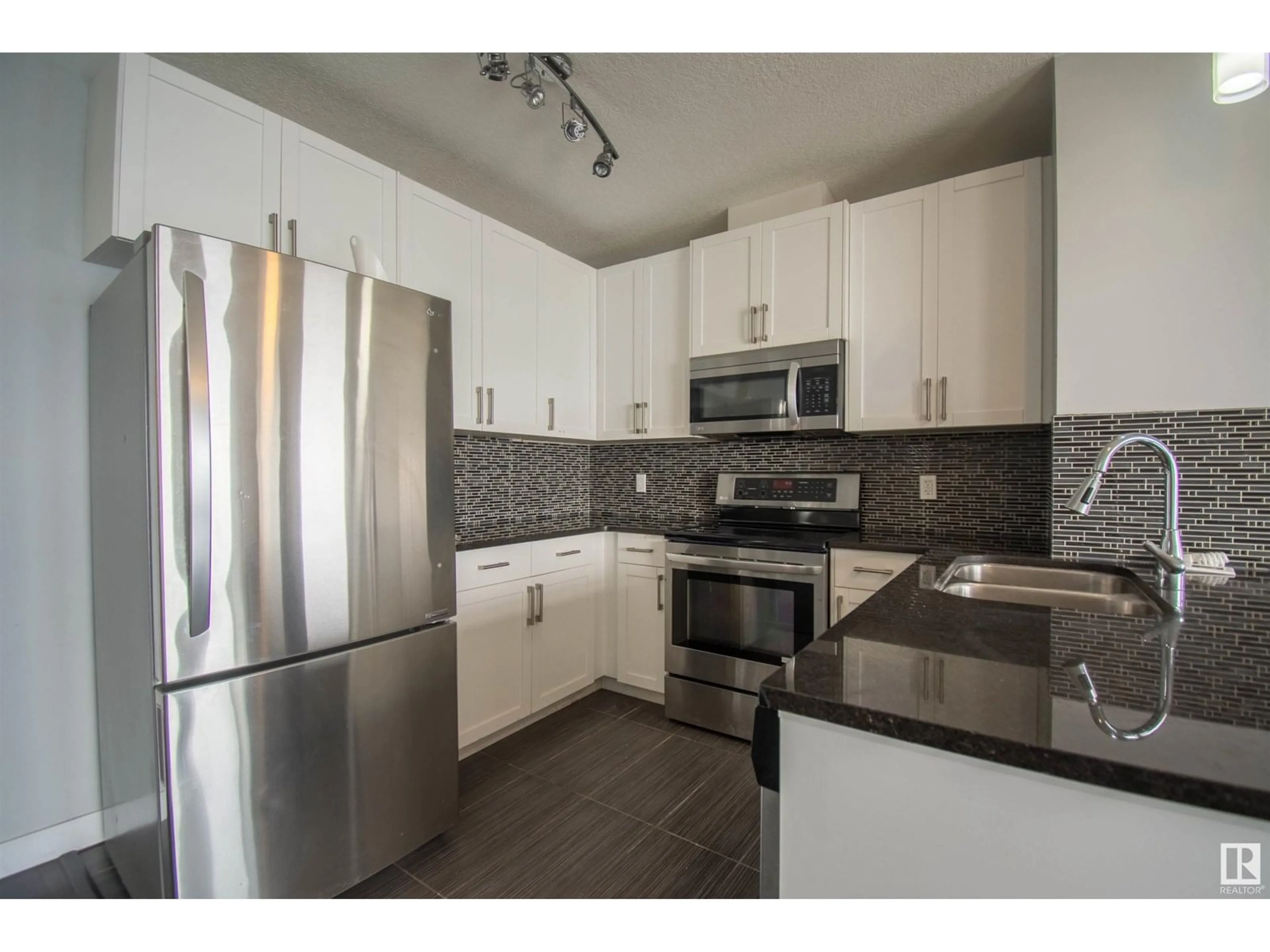 Open concept kitchen, unknown for 5151 - 731 WINDERMERE BV, Edmonton Alberta T6W2K4