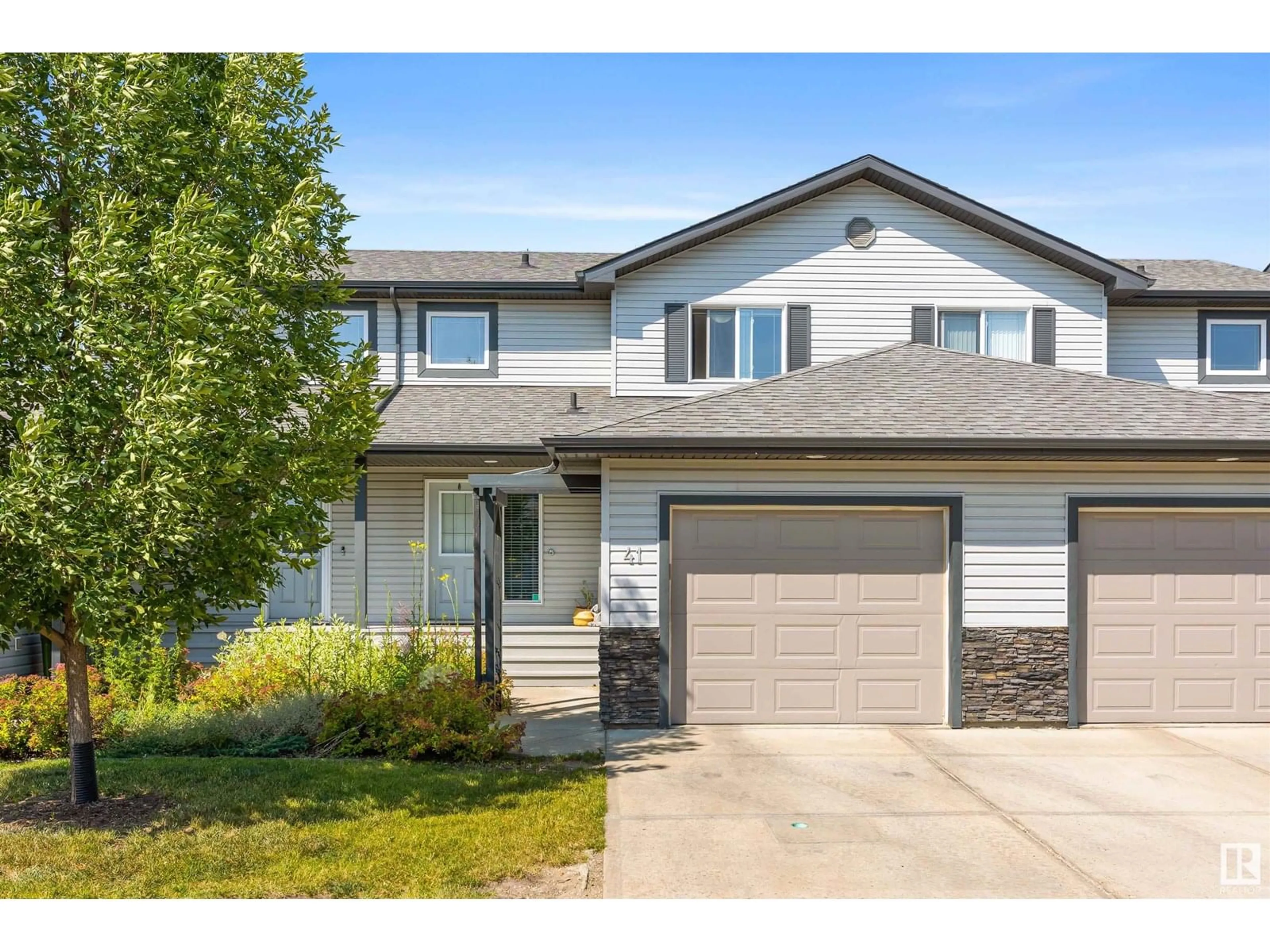 Home with vinyl exterior material, street for #41 - 13838 166 AV, Edmonton Alberta T6V0K3
