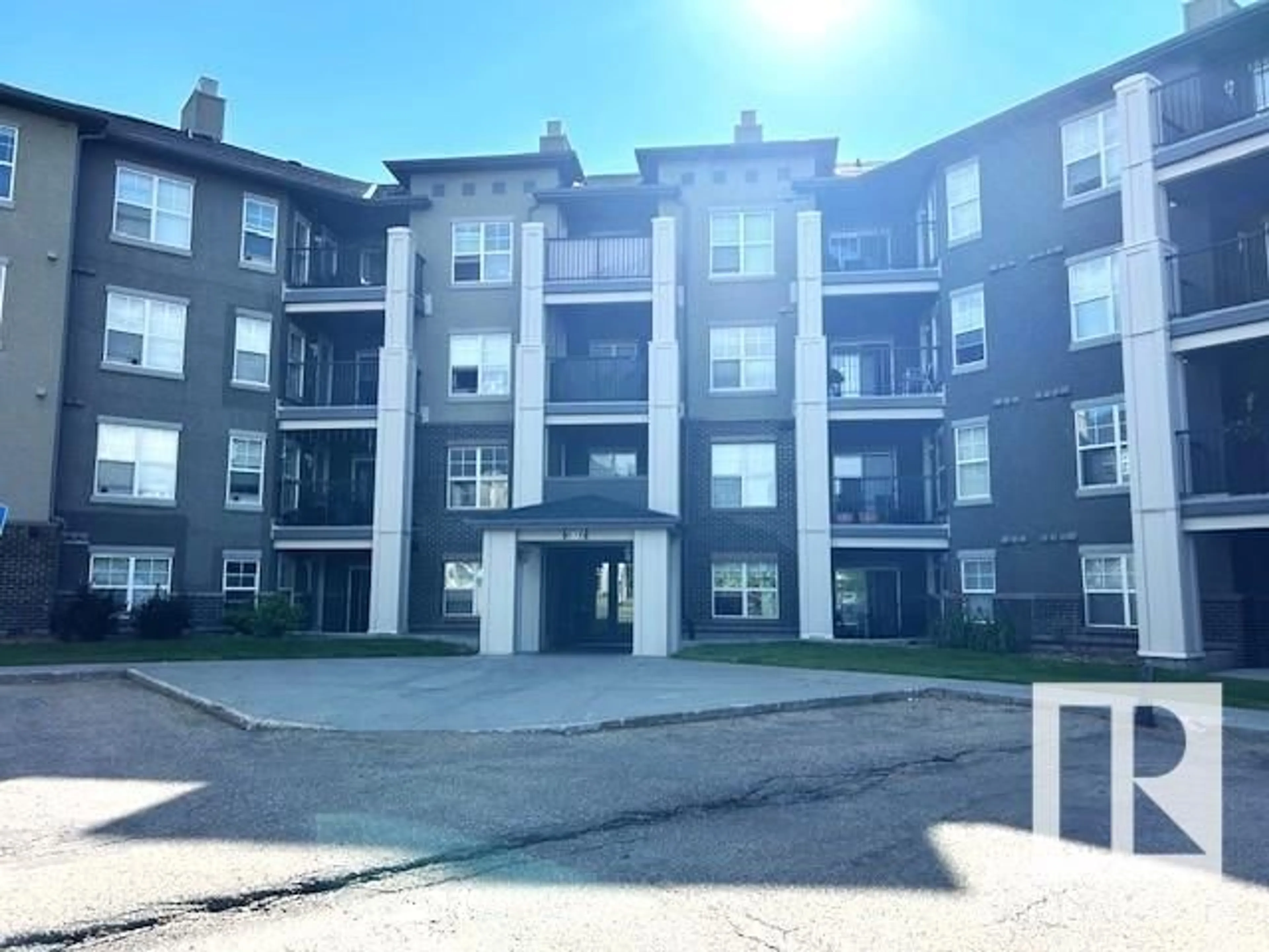 A pic from outside/outdoor area/front of a property/back of a property/a pic from drone, building for #212 - 616 MCALLISTER LO, Edmonton Alberta T6W1N1