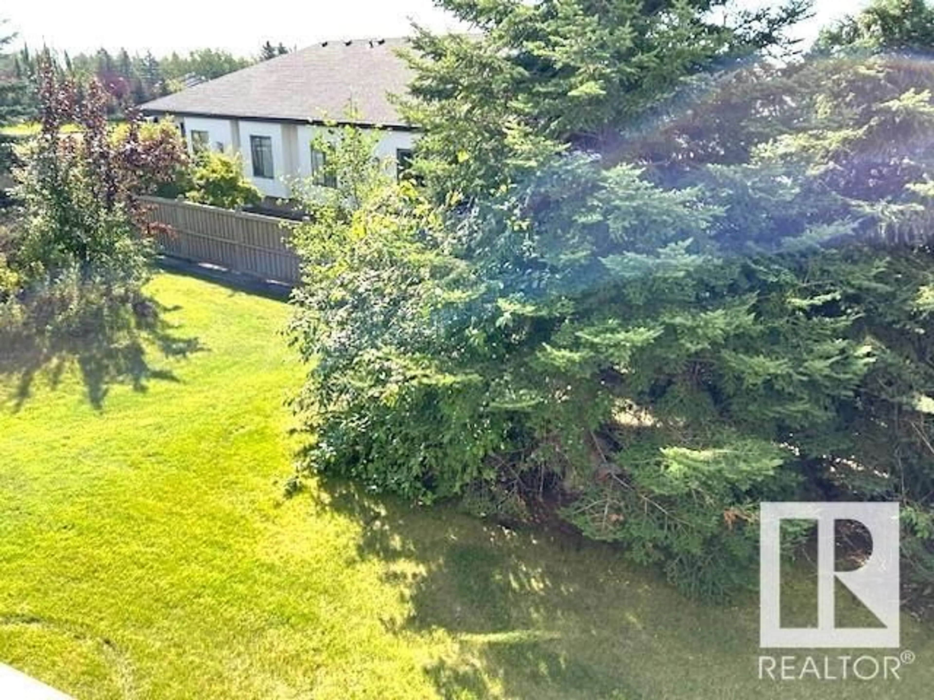 A pic from outside/outdoor area/front of a property/back of a property/a pic from drone, water/lake/river/ocean view for #212 - 616 MCALLISTER LO, Edmonton Alberta T6W1N1