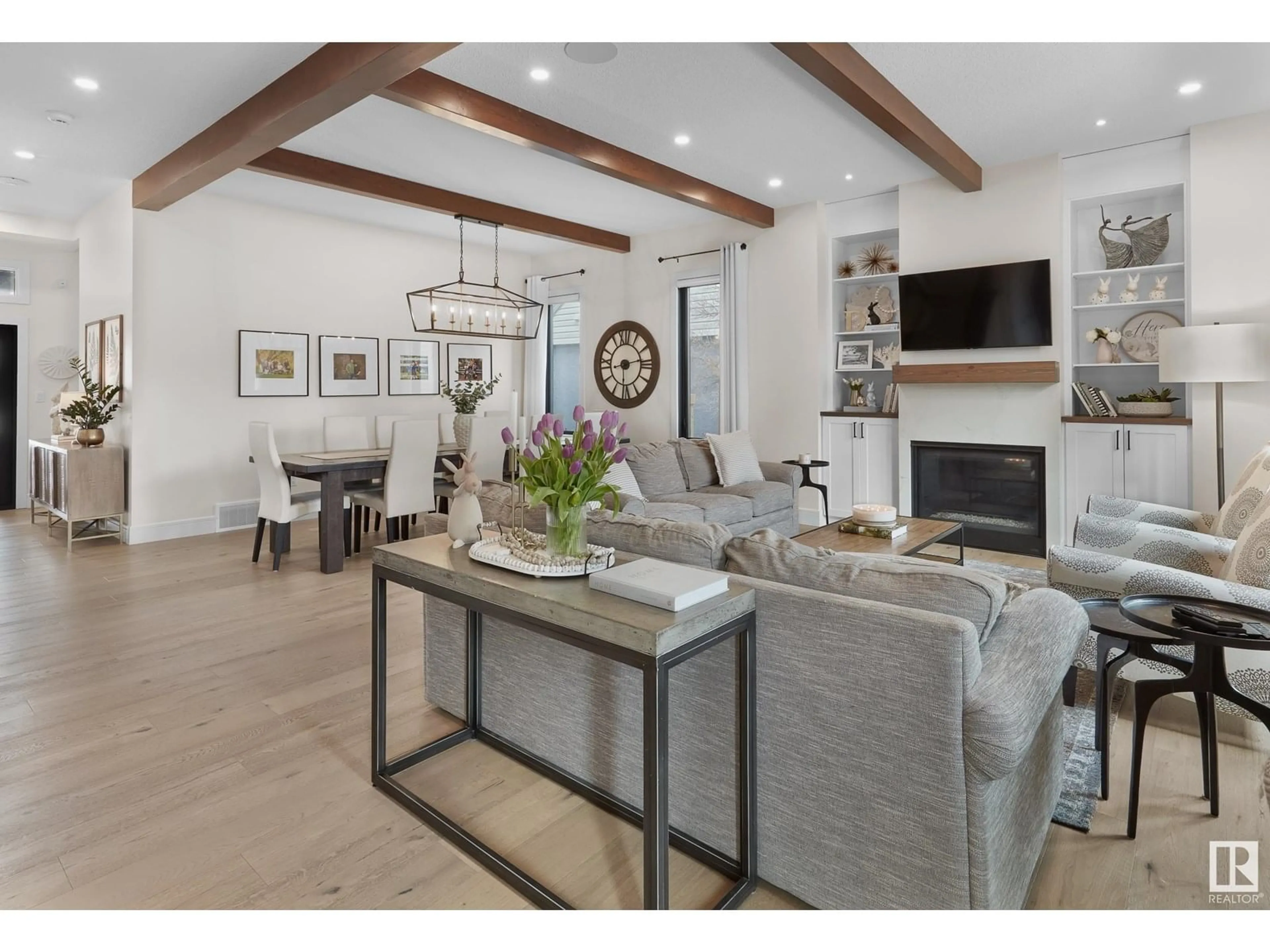 Living room with furniture, wood/laminate floor for 10934 131 ST, Edmonton Alberta T5M1B4