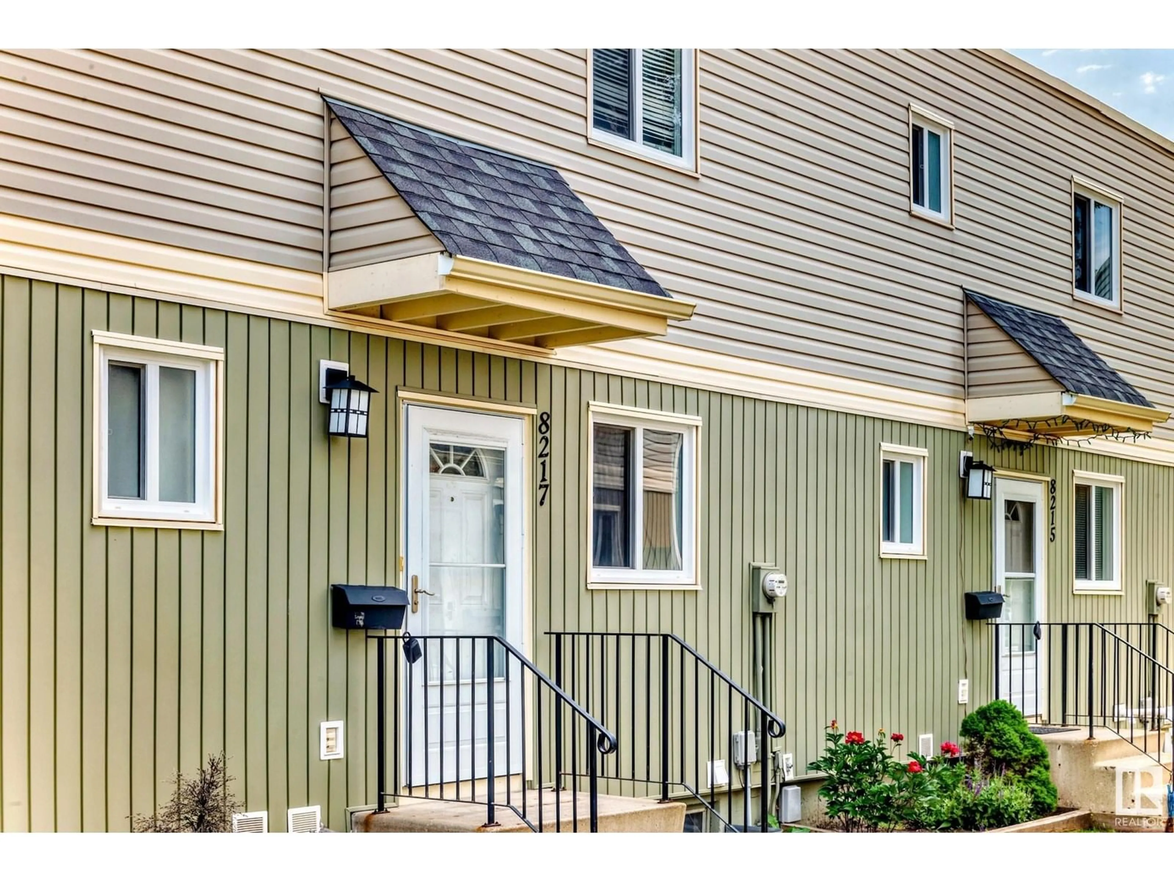 Home with vinyl exterior material, street for NW - 8217 182 ST, Edmonton Alberta T2T1L2