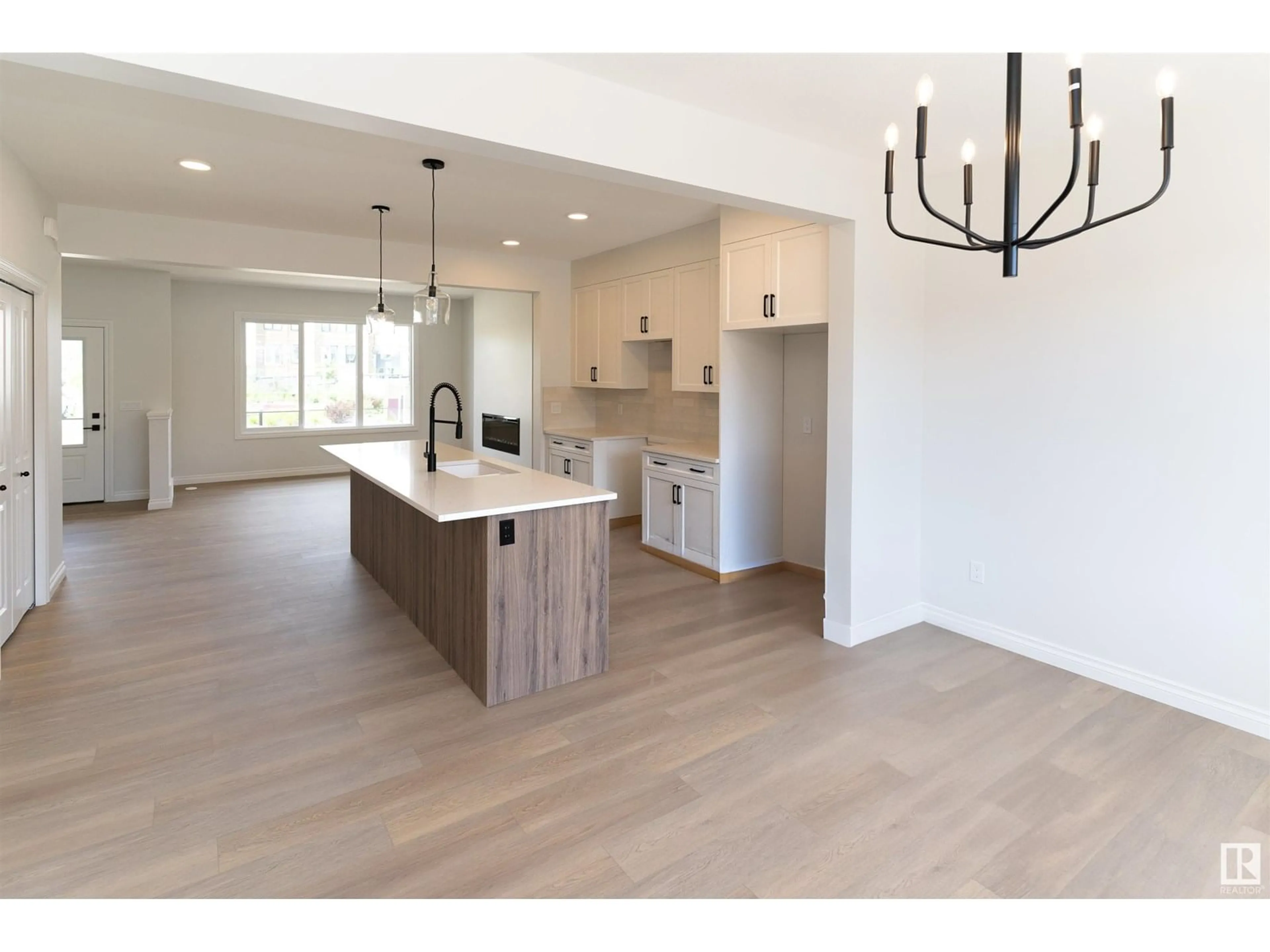 Open concept kitchen, wood/laminate floor for 6343 GREENAWAY AV, Edmonton Alberta T5E6Y6