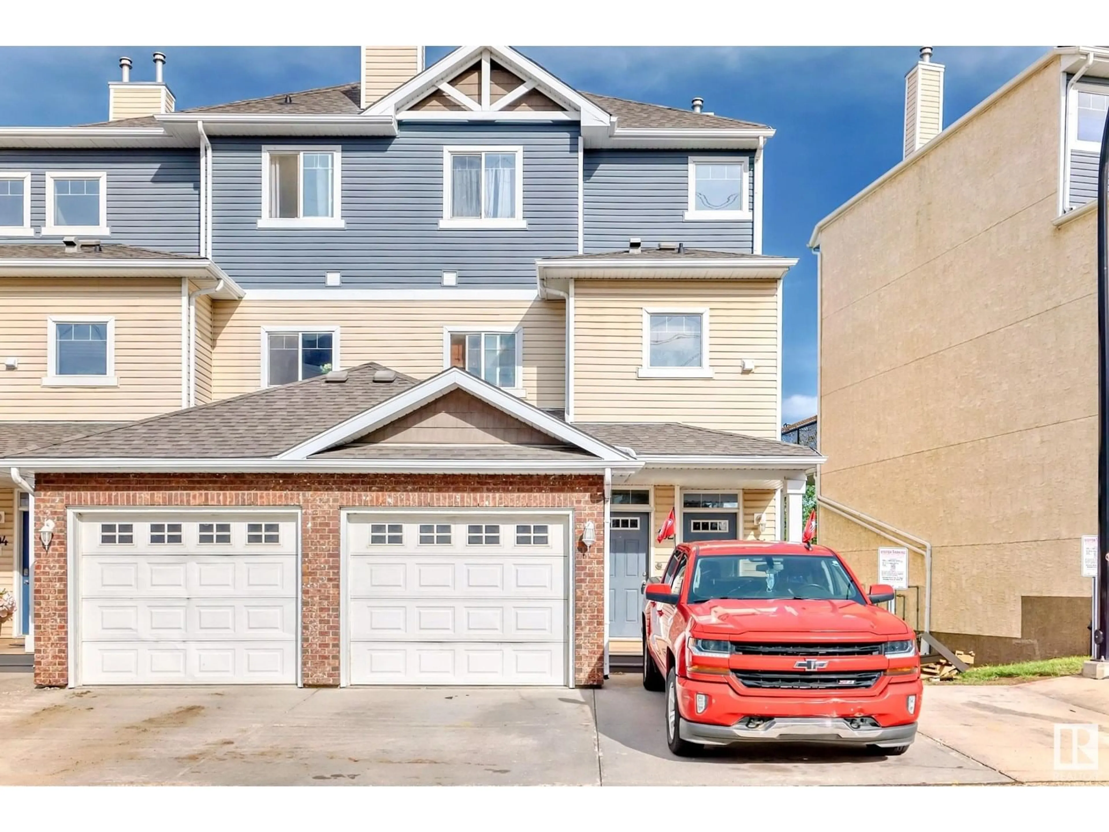 Home with vinyl exterior material, street for #102 - 3010 33 AV, Edmonton Alberta T6T0C3