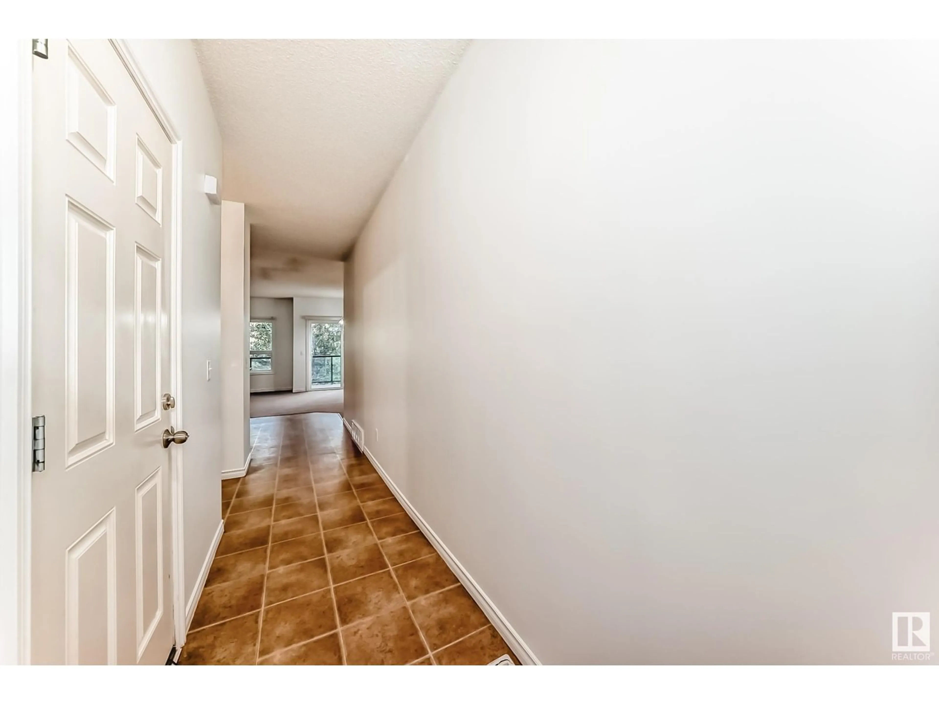 Indoor entryway for #102 - 3010 33 AV, Edmonton Alberta T6T0C3