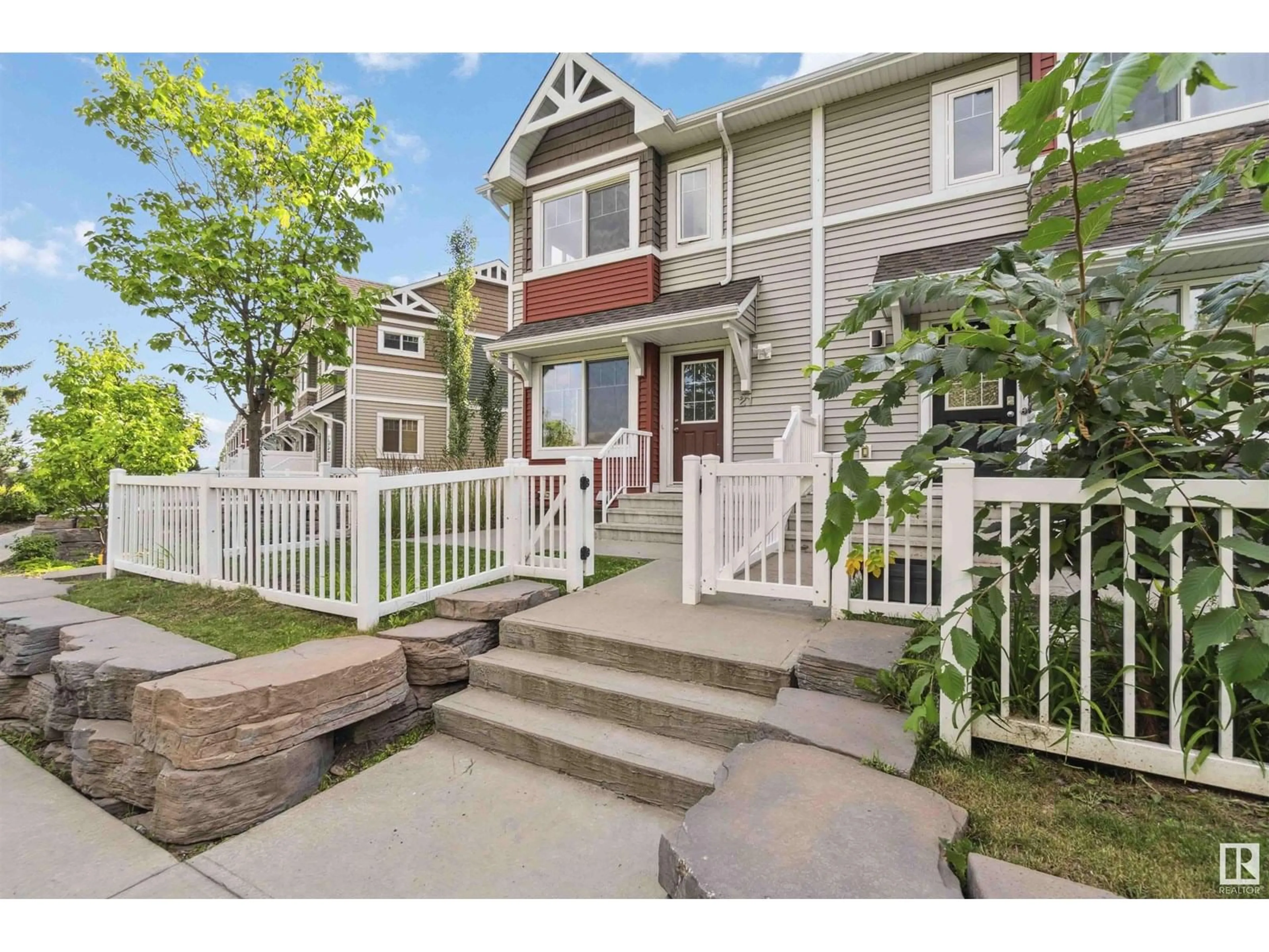 Home with vinyl exterior material, street for #21 - 415 CLAREVIEW RD, Edmonton Alberta T5A0Z6