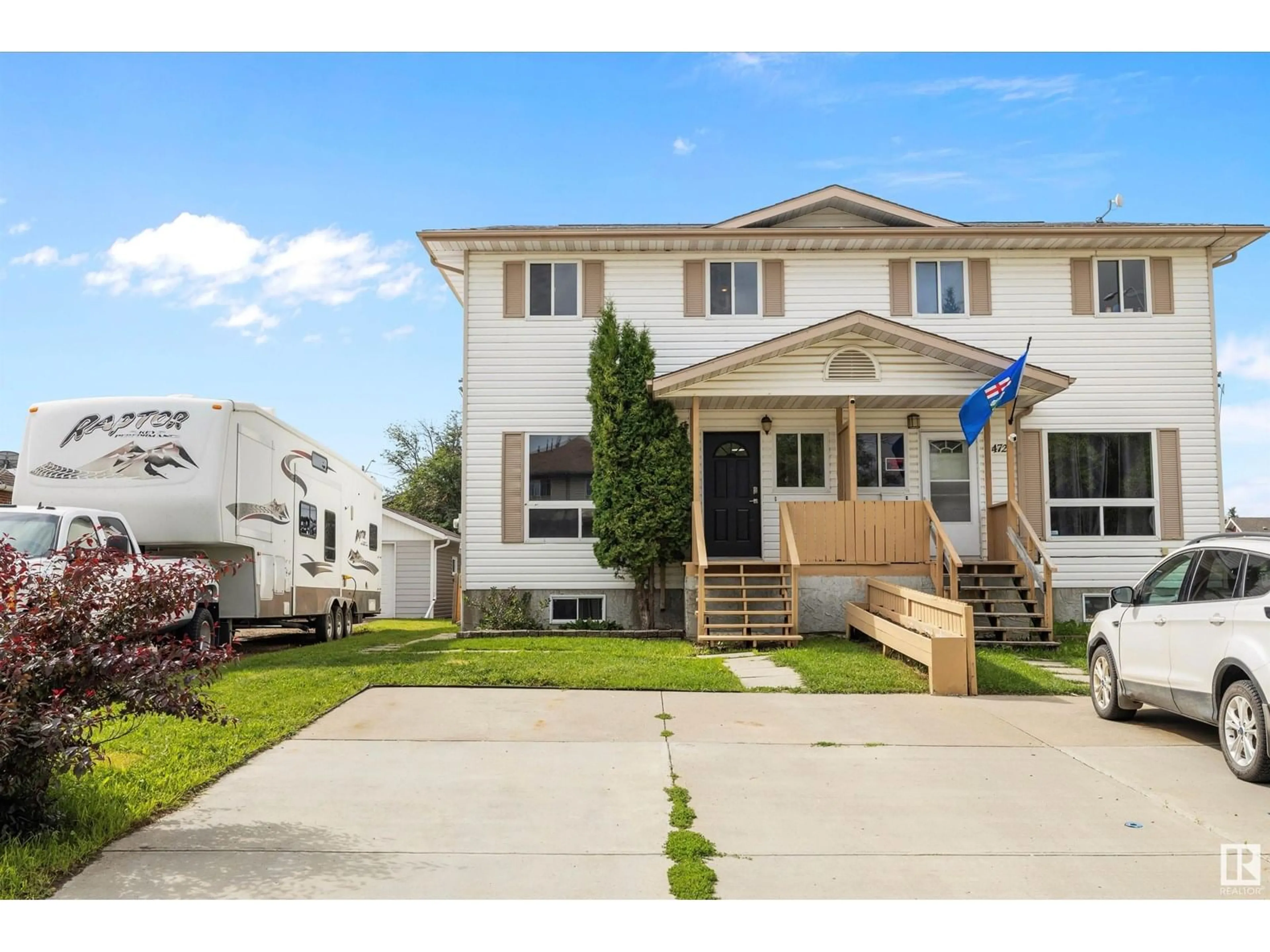 Home with vinyl exterior material, street for 4719 49 AV, Calmar Alberta T0C0V0