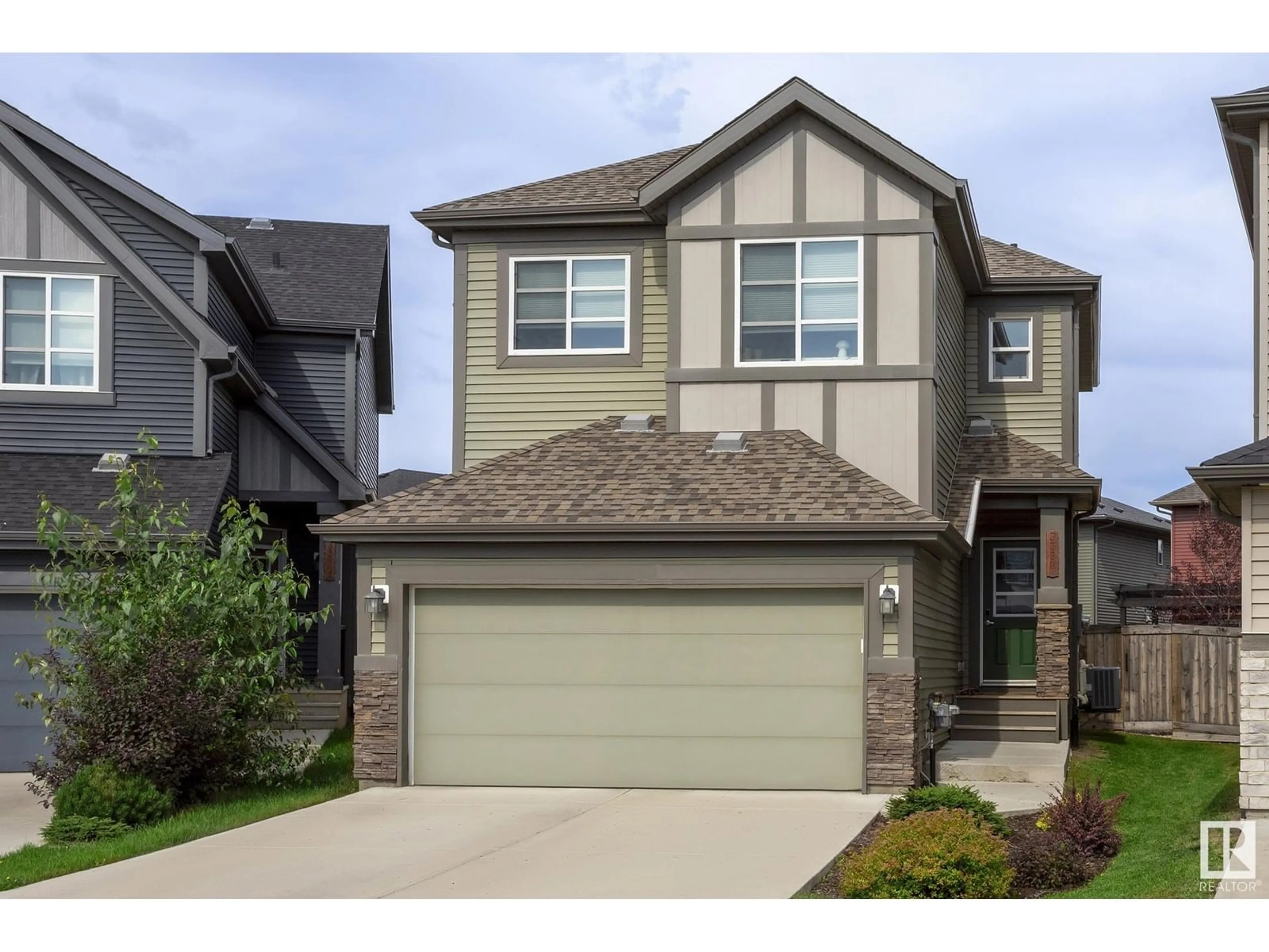 Home with vinyl exterior material, street for SW - 3338 CHECKNITA CM, Edmonton Alberta T6W4E9