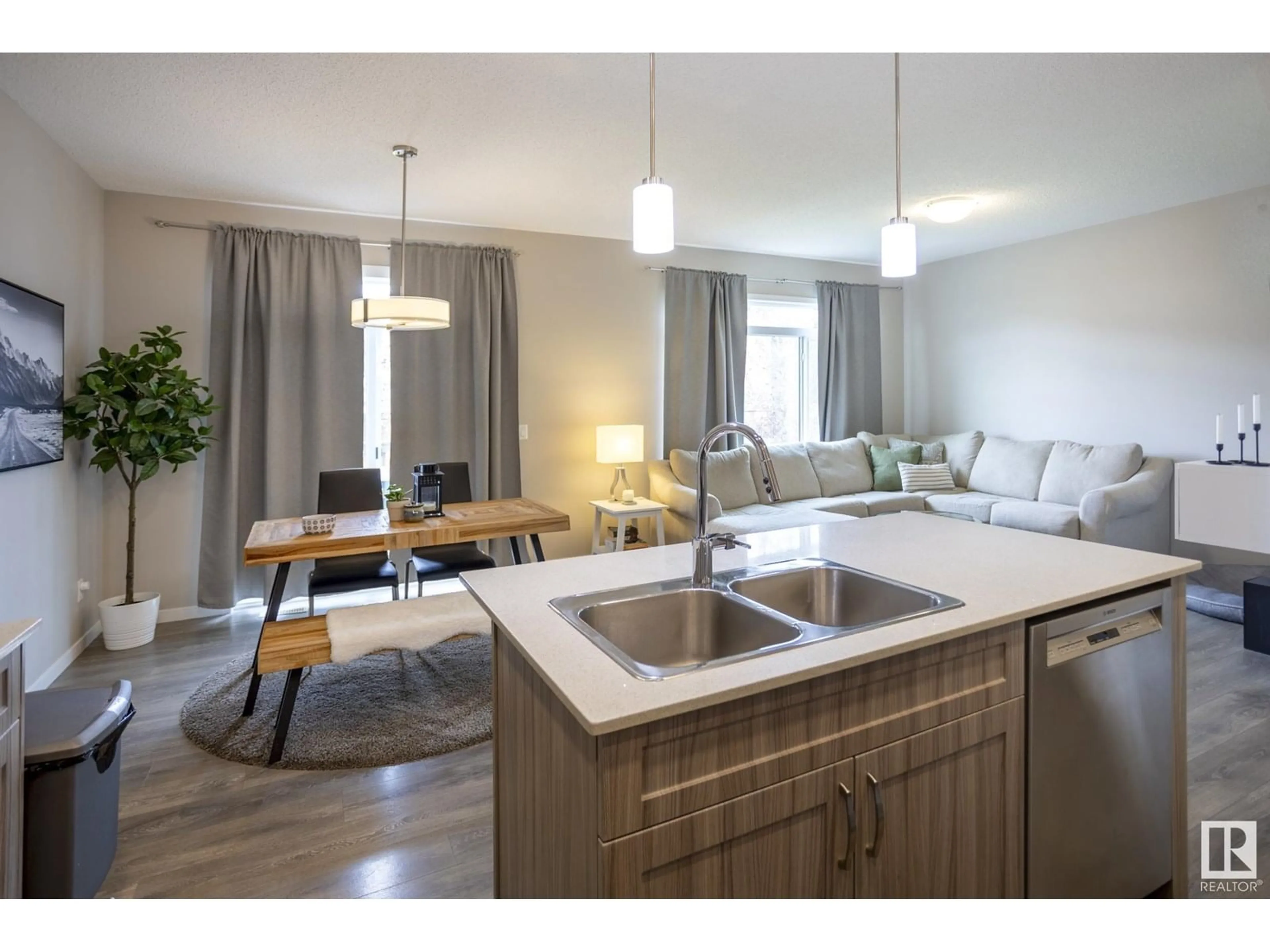 Open concept kitchen, wood/laminate floor for SW - 3338 CHECKNITA CM, Edmonton Alberta T6W4E9