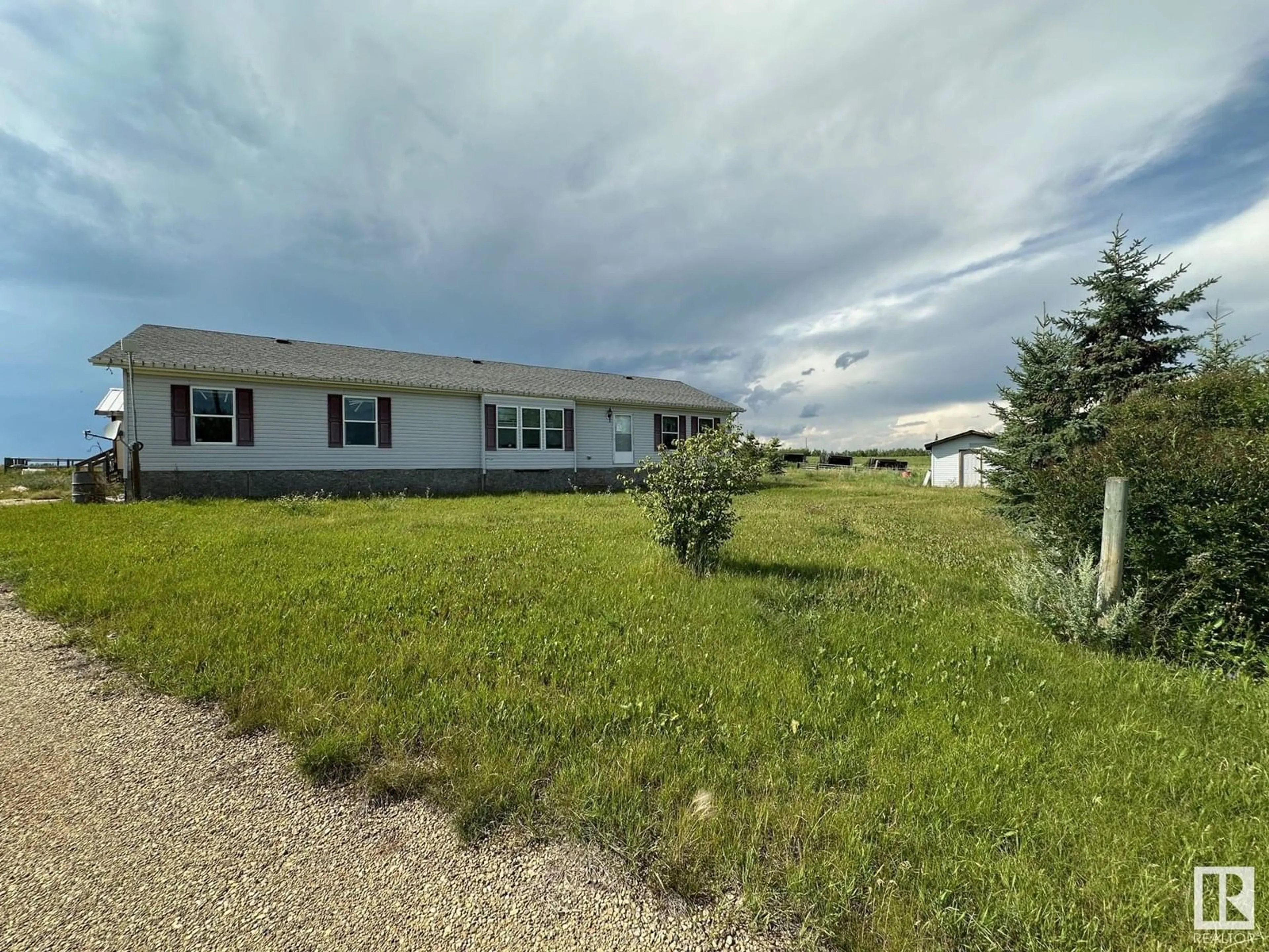 A pic from outside/outdoor area/front of a property/back of a property/a pic from drone, water/lake/river/ocean view for 50566 RANGE ROAD 220, Rural Leduc County Alberta T0B3M0
