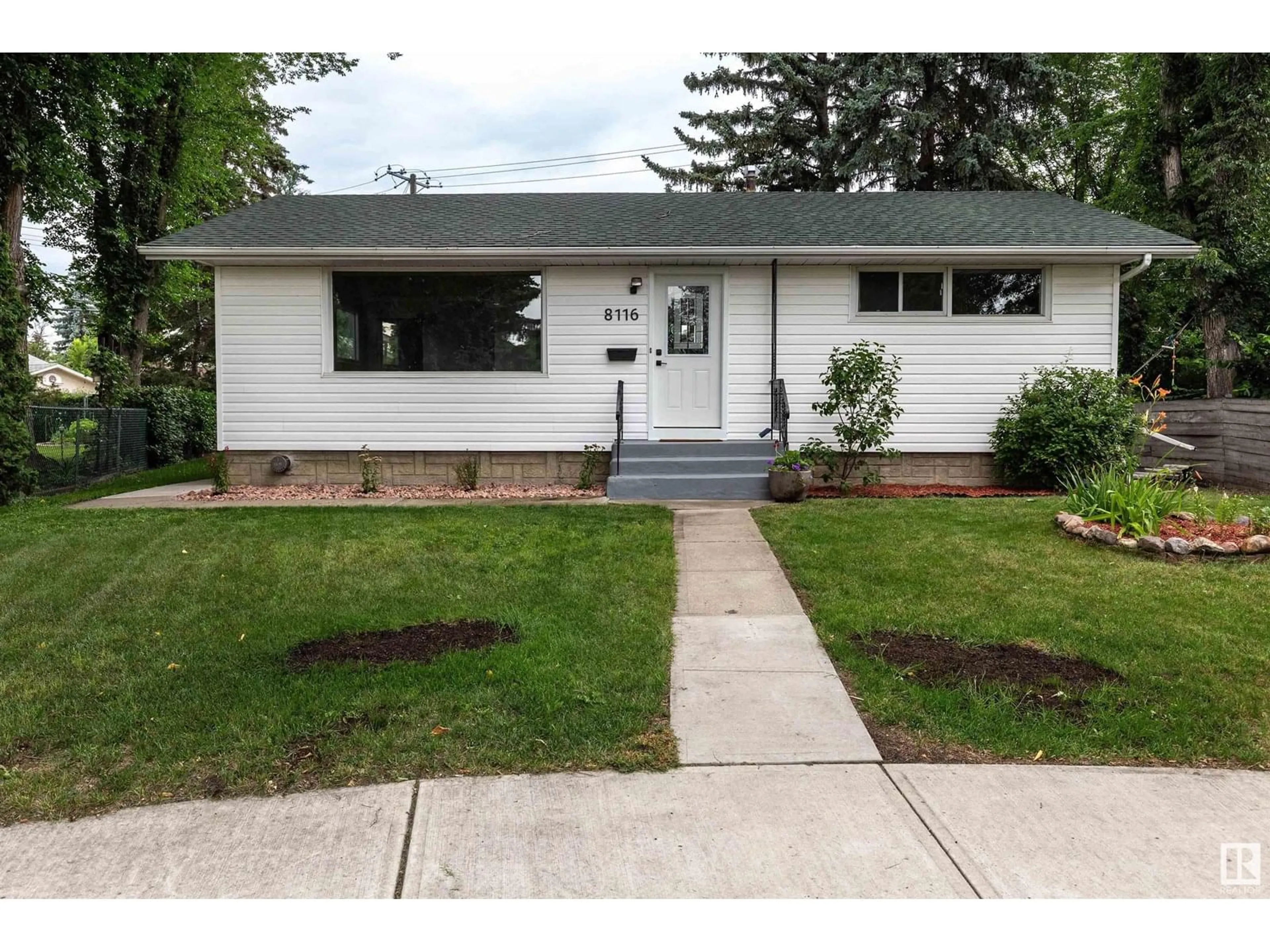 Home with vinyl exterior material, street for 8116 158 ST, Edmonton Alberta T5R2C1