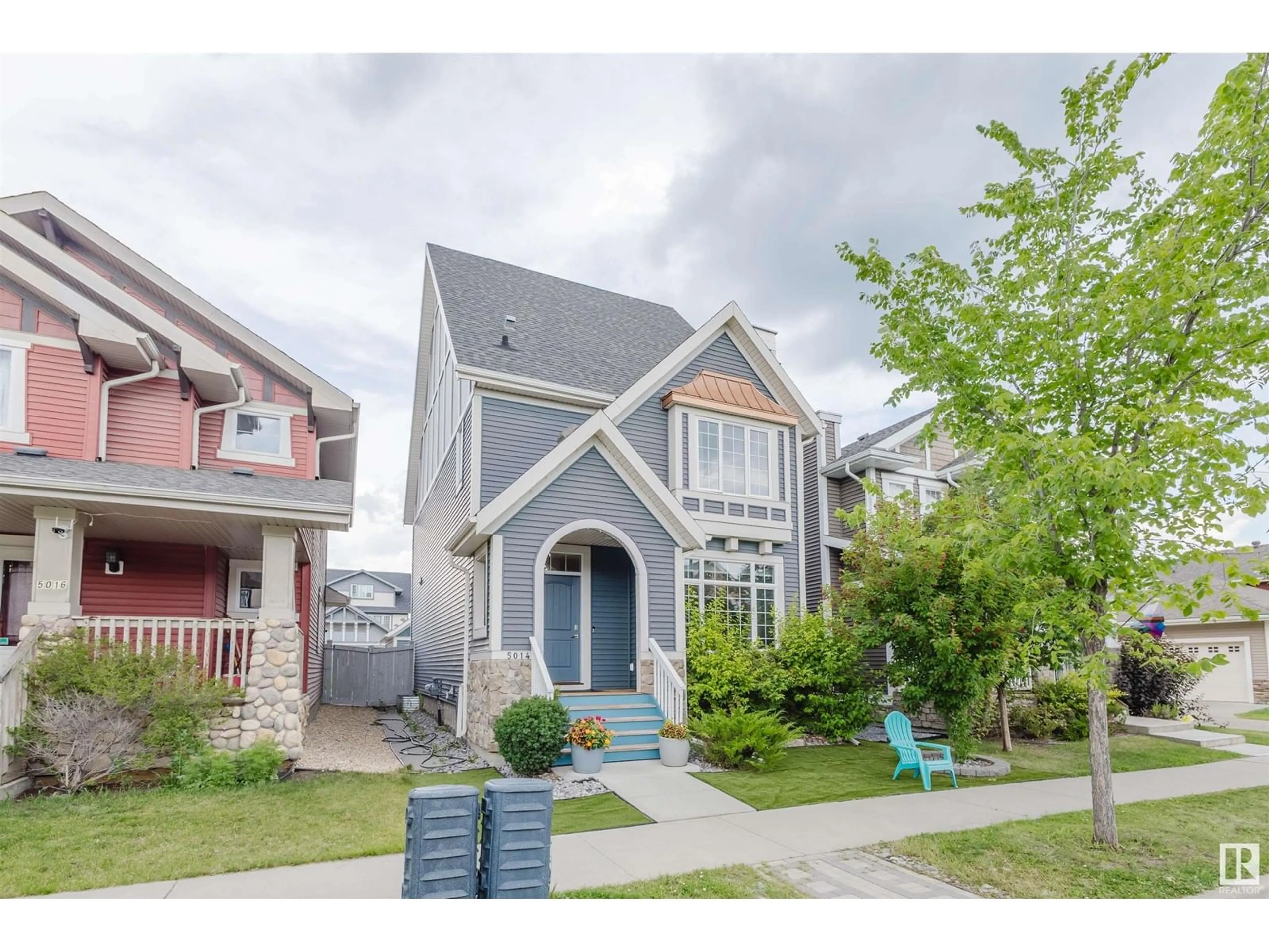 Home with vinyl exterior material, street for 5014 DEWOLF RD, Edmonton Alberta T5E6R4