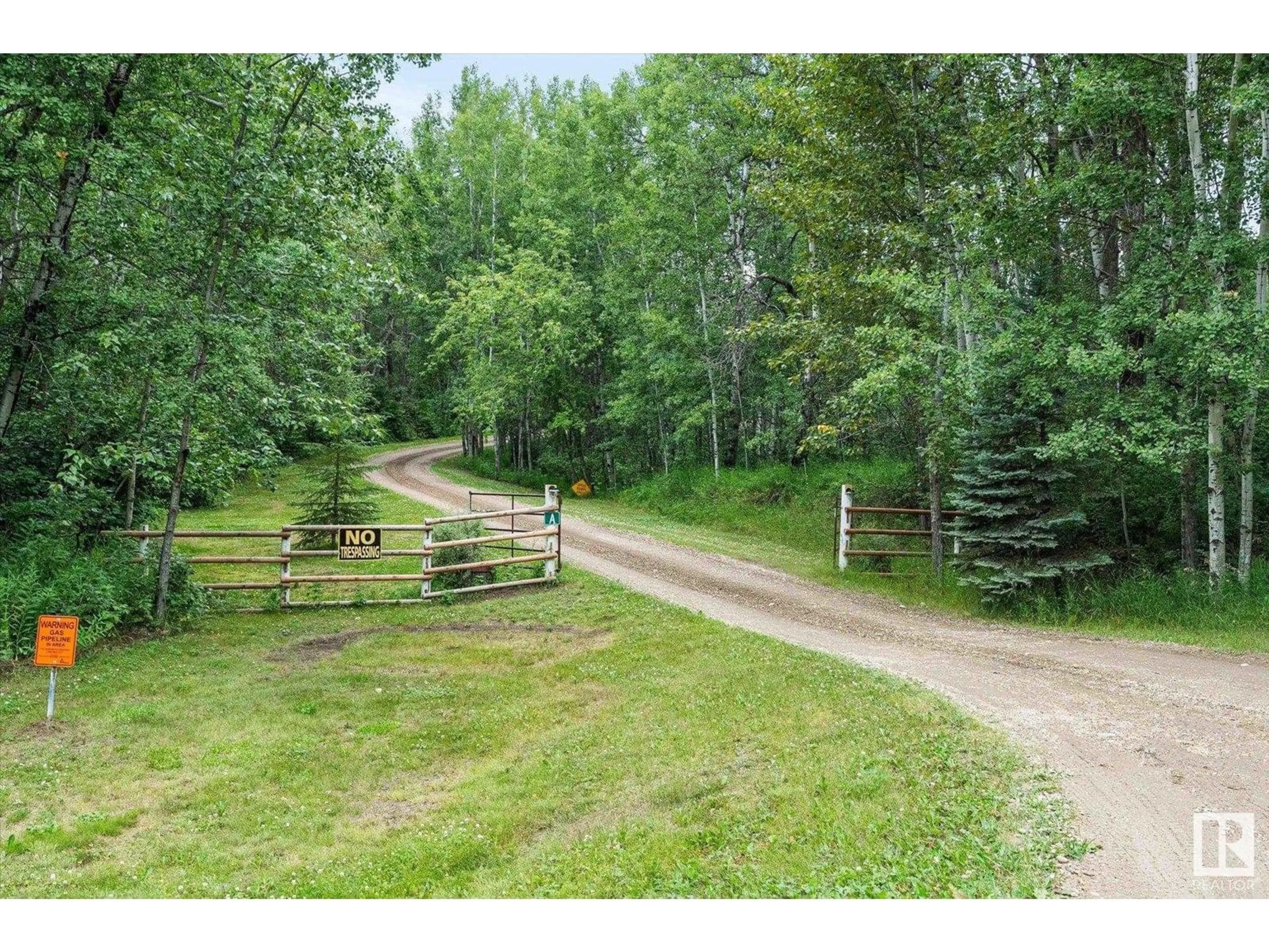 A pic from outside/outdoor area/front of a property/back of a property/a pic from drone, forest/trees view for 53027 RGE ROAD 20, Rural Parkland County Alberta T7Y2G8