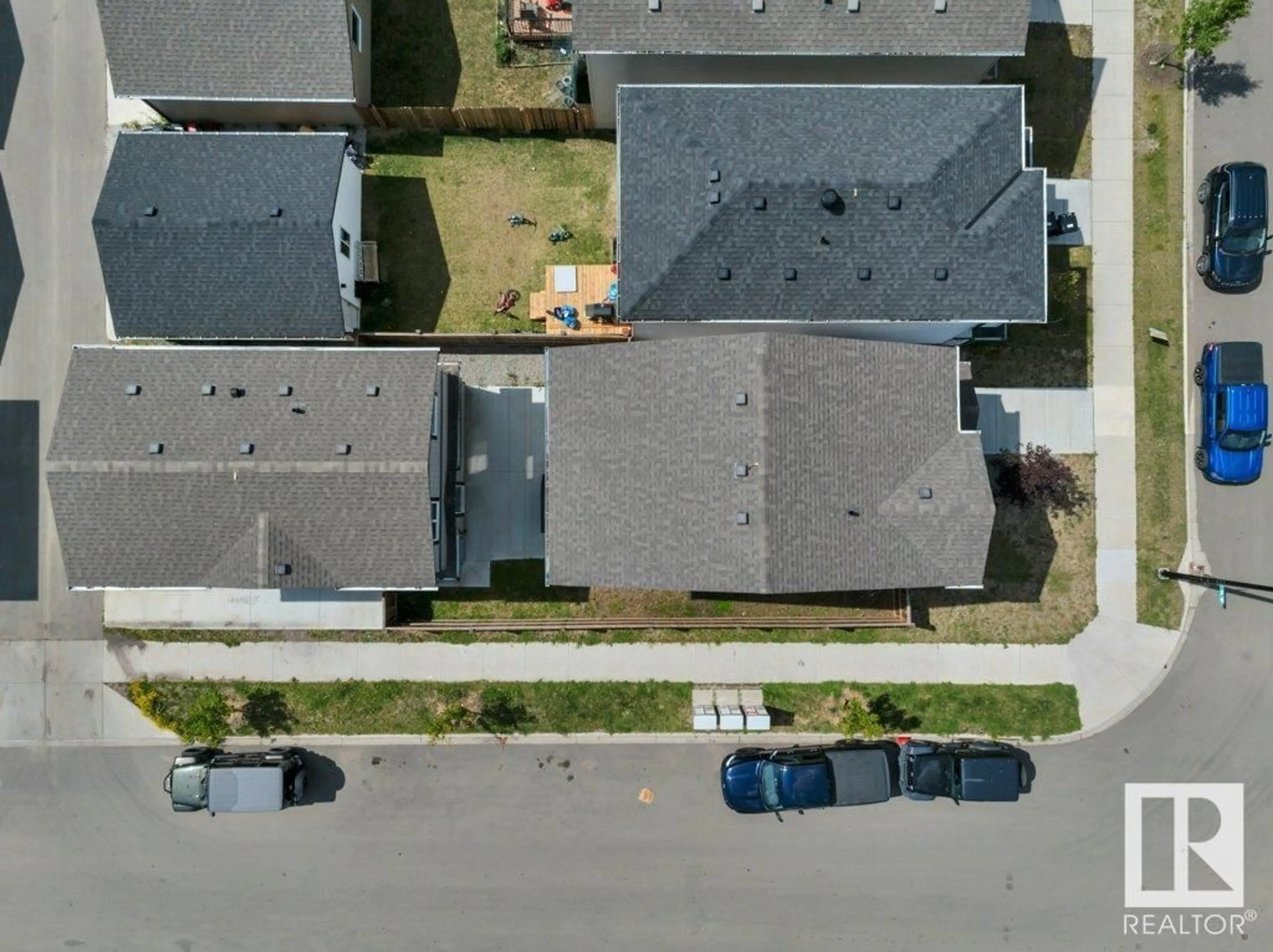 A pic from outside/outdoor area/front of a property/back of a property/a pic from drone, street for 6507 176 AV, Edmonton Alberta T5Y4B2