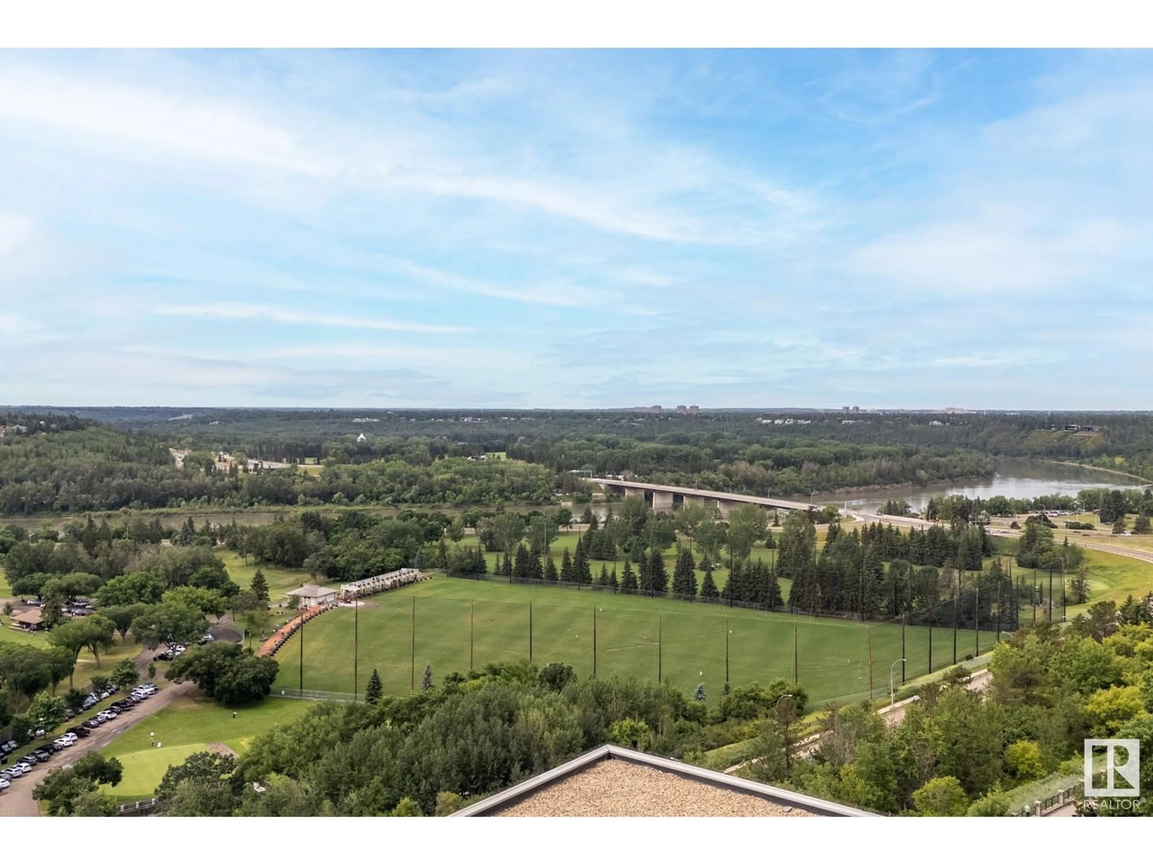 A pic from outside/outdoor area/front of a property/back of a property/a pic from drone, water/lake/river/ocean view for 11933 - 1200 JASPER AV, Edmonton Alberta T5K0P1
