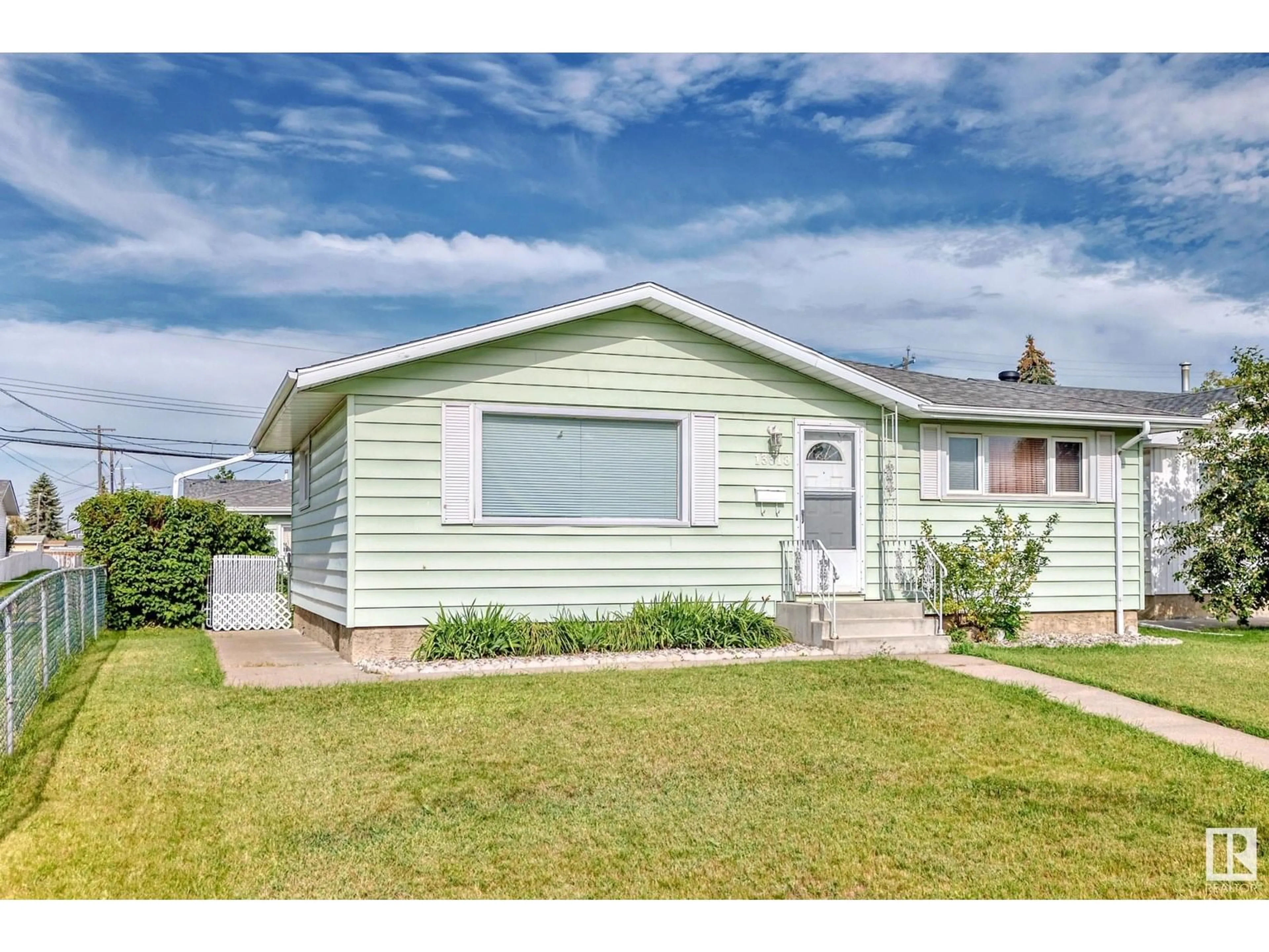 Home with vinyl exterior material, street for 13318 91 ST, Edmonton Alberta T5E3P8