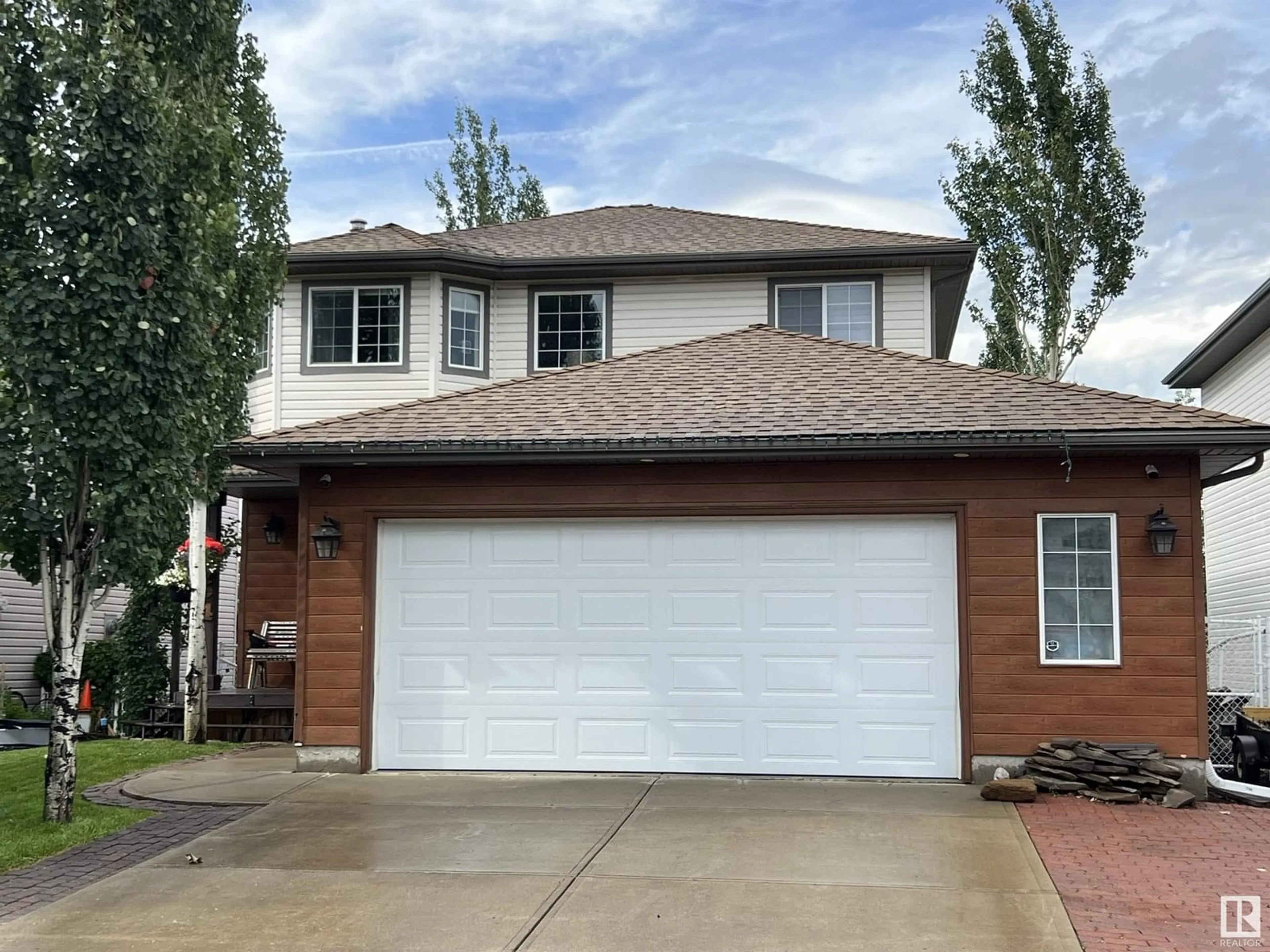 Home with vinyl exterior material, street for 354 WILD ROSE WY, Edmonton Alberta T6T1P3