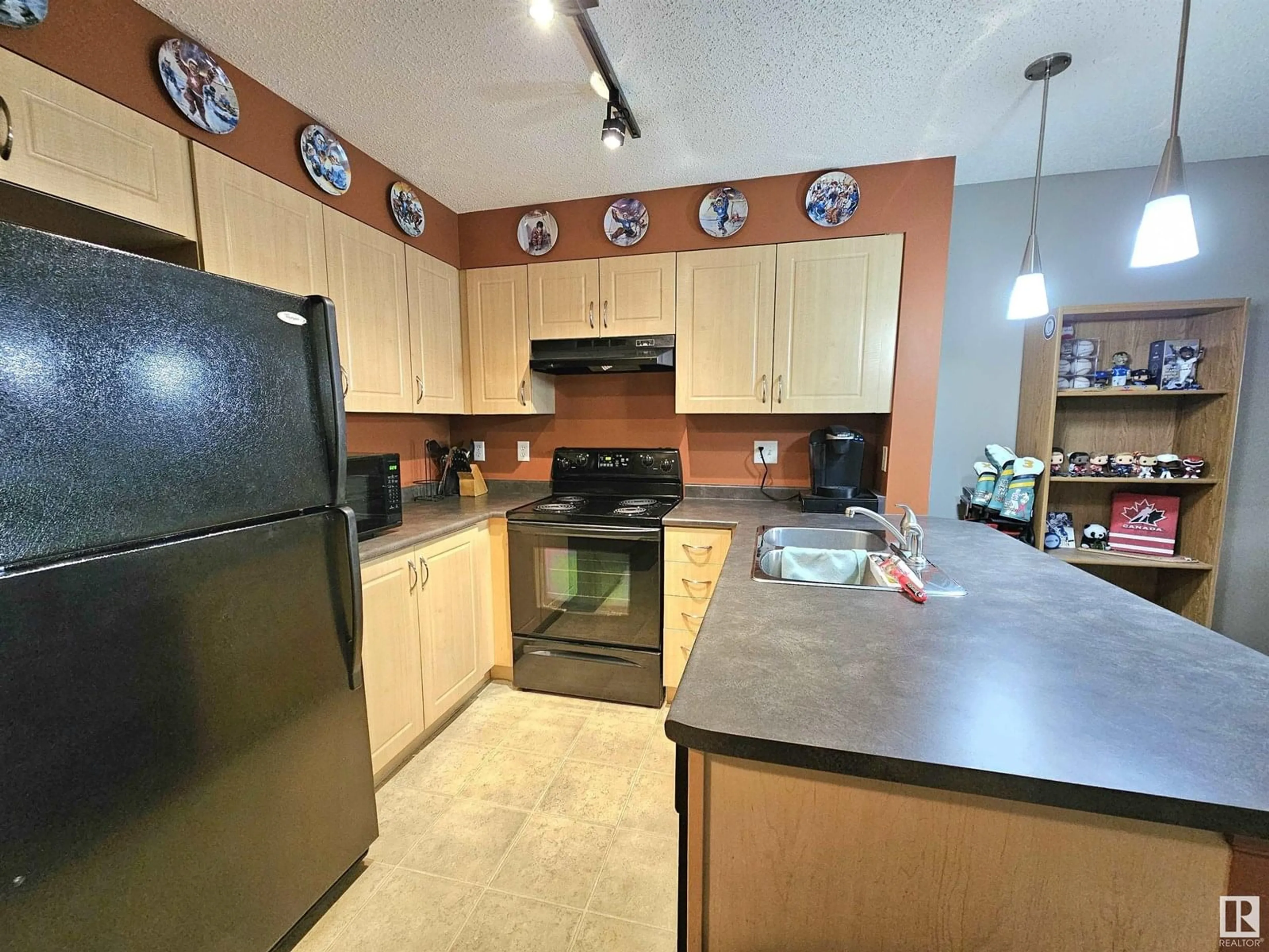 Standard kitchen, ceramic/tile floor for #105 - 11445 ELLERSLIE RD, Edmonton Alberta T6W1T1