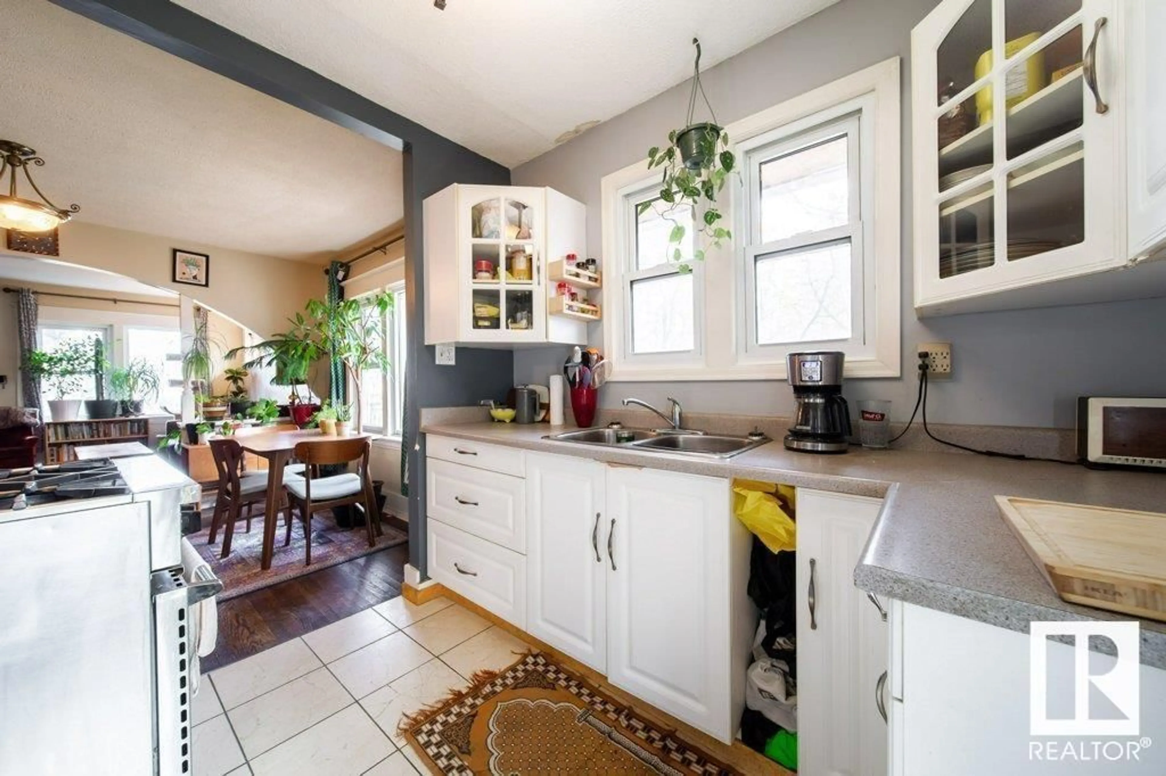 Open concept kitchen, ceramic/tile floor for 10417 85 AV, Edmonton Alberta T6E2K2