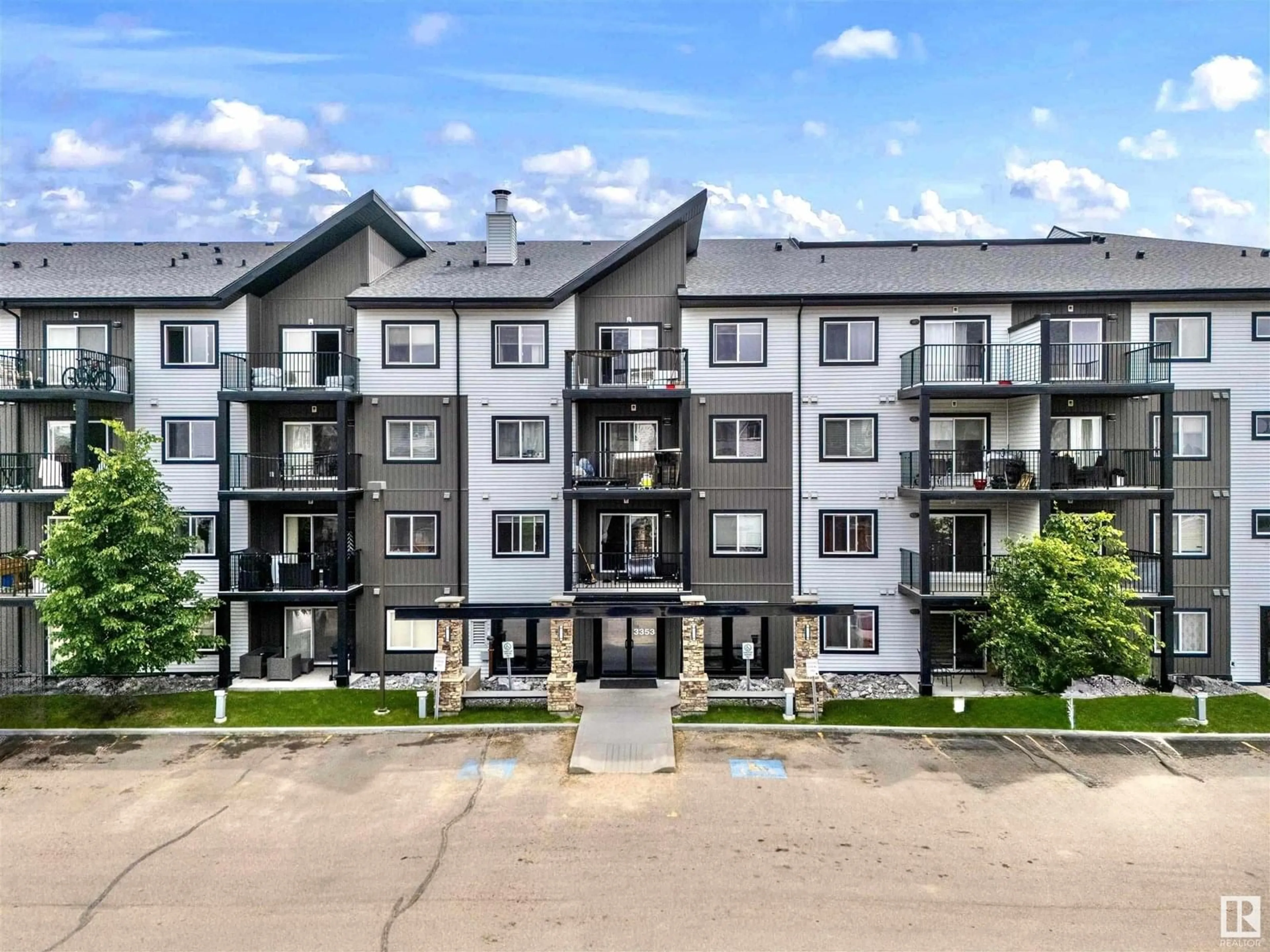 A pic from outside/outdoor area/front of a property/back of a property/a pic from drone, unknown for #402 - 3353 16A AV, Edmonton Alberta T6T0V4