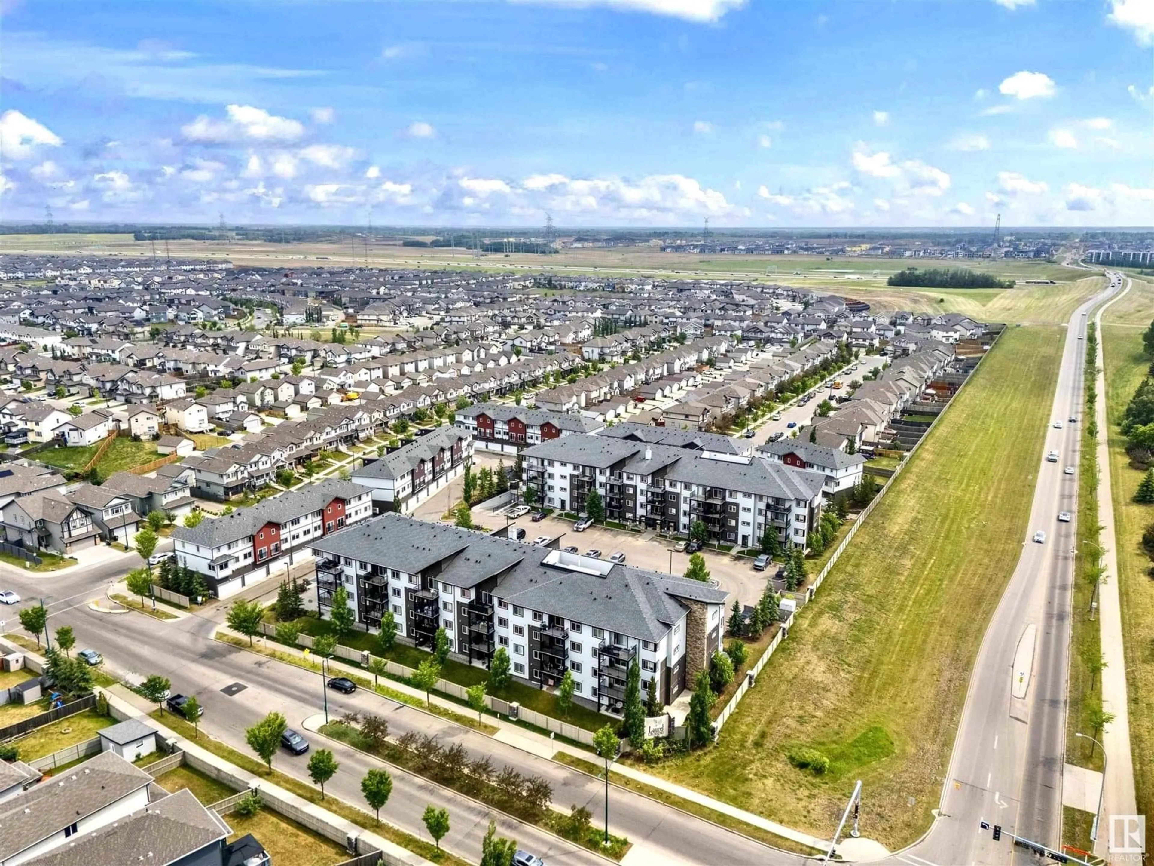 A pic from outside/outdoor area/front of a property/back of a property/a pic from drone, unknown for #402 - 3353 16A AV, Edmonton Alberta T6T0V4