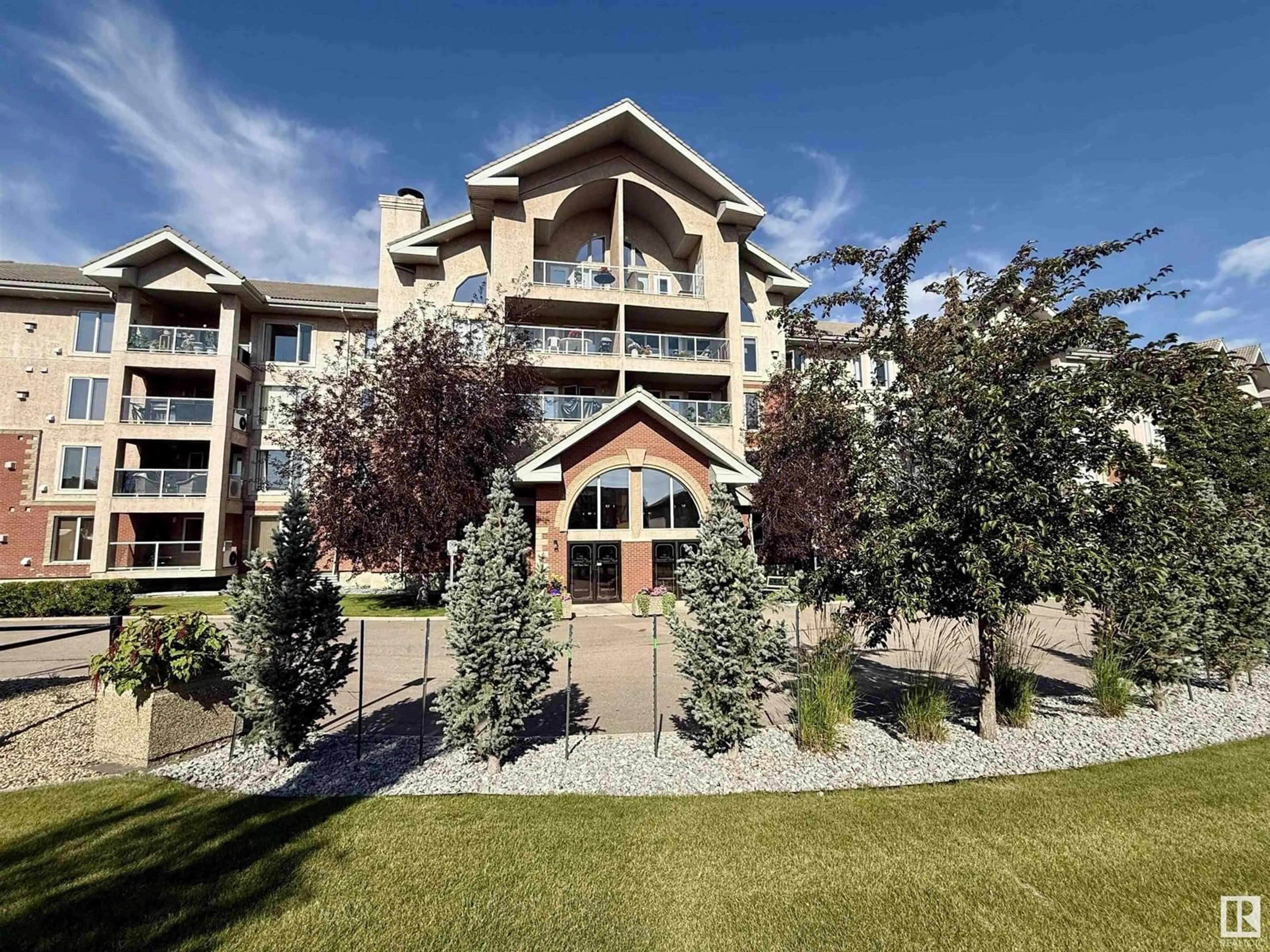 A pic from outside/outdoor area/front of a property/back of a property/a pic from drone, unknown for #414 - 200 BETHEL DR, Sherwood Park Alberta T8H2C5