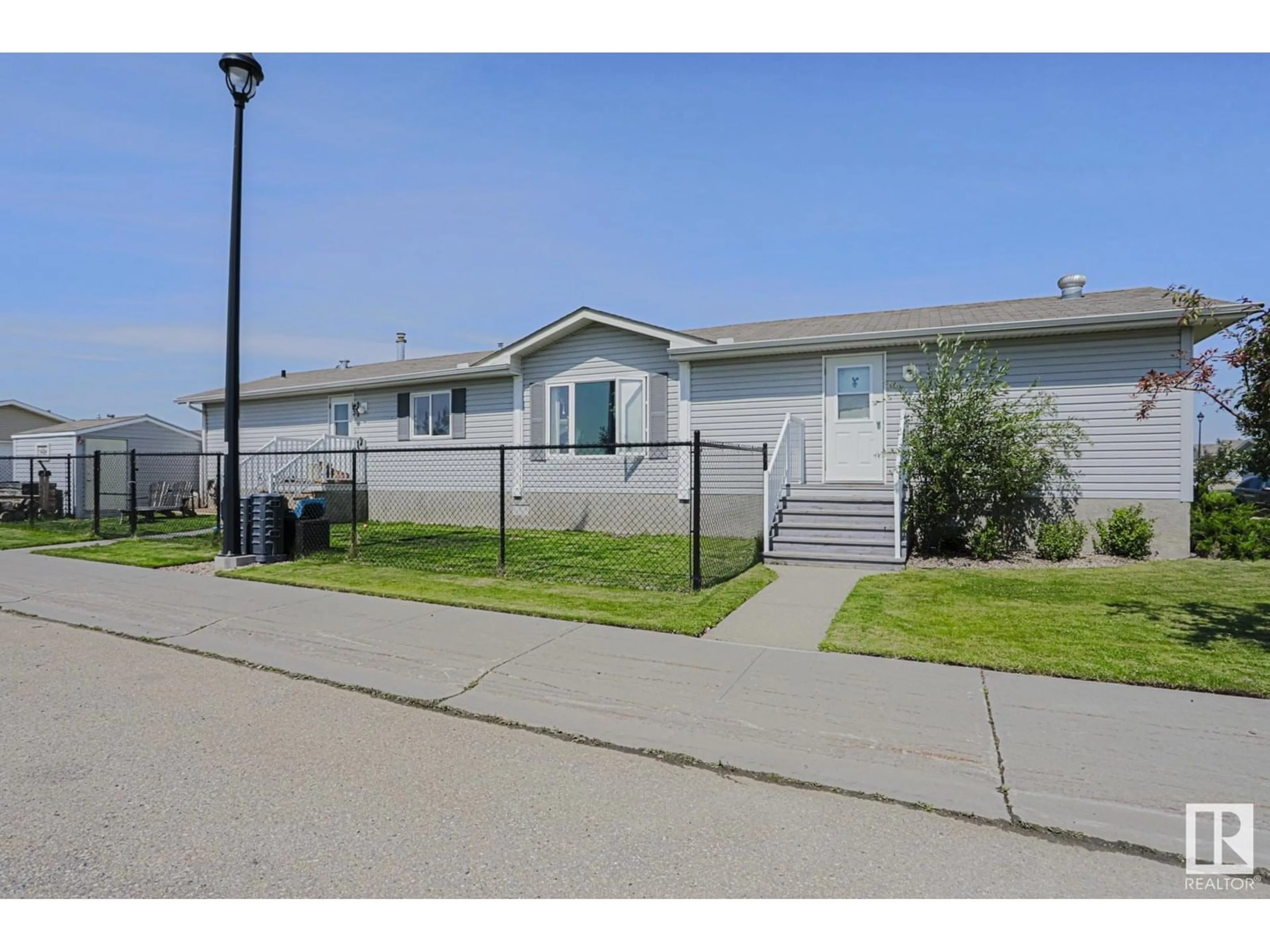 Home with vinyl exterior material, street for 4000 ASPEN WY, Leduc Alberta T9E8P9