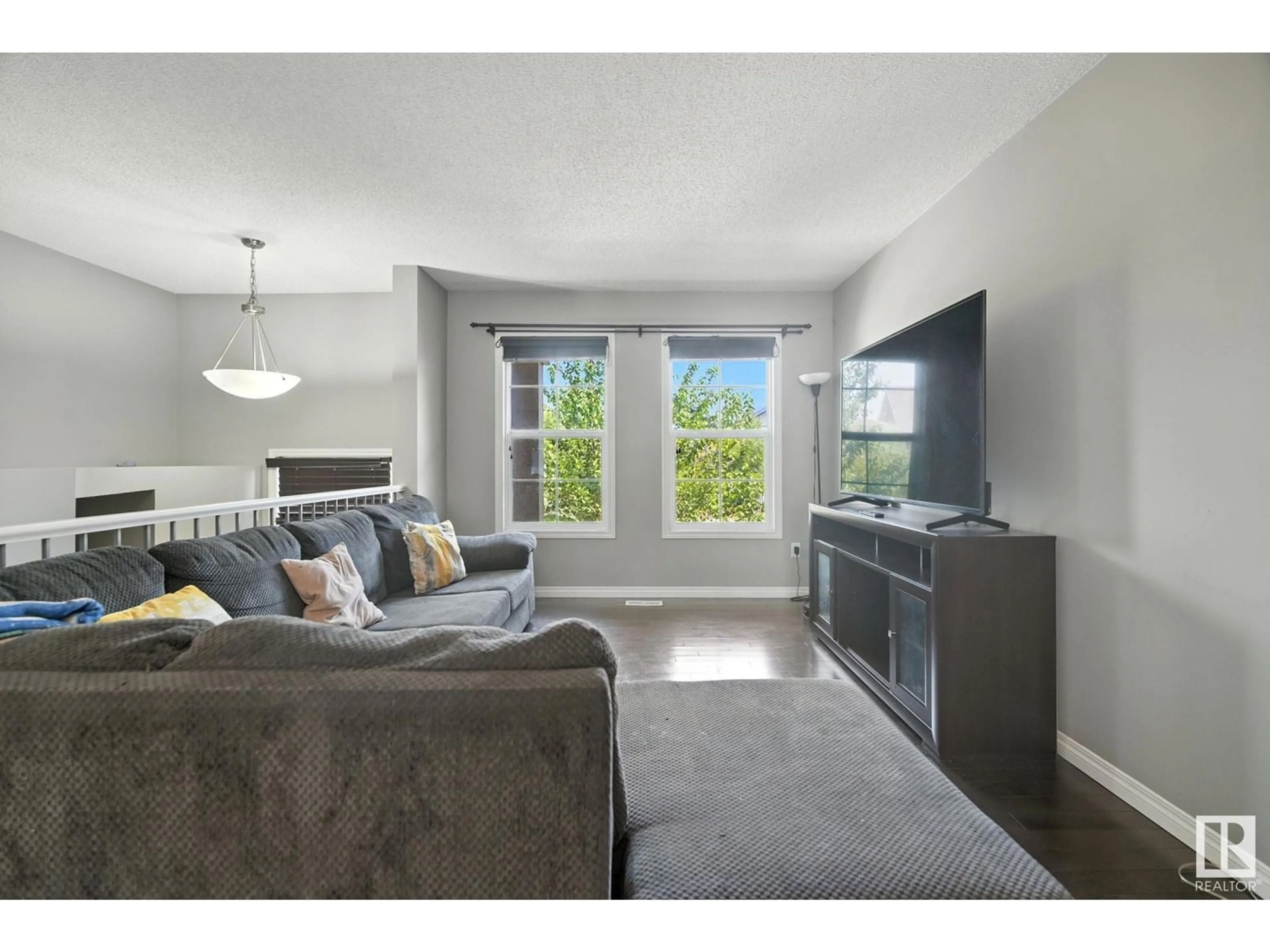 Living room with furniture, unknown for 4033 ORCHARDS DR, Edmonton Alberta T6X1V2