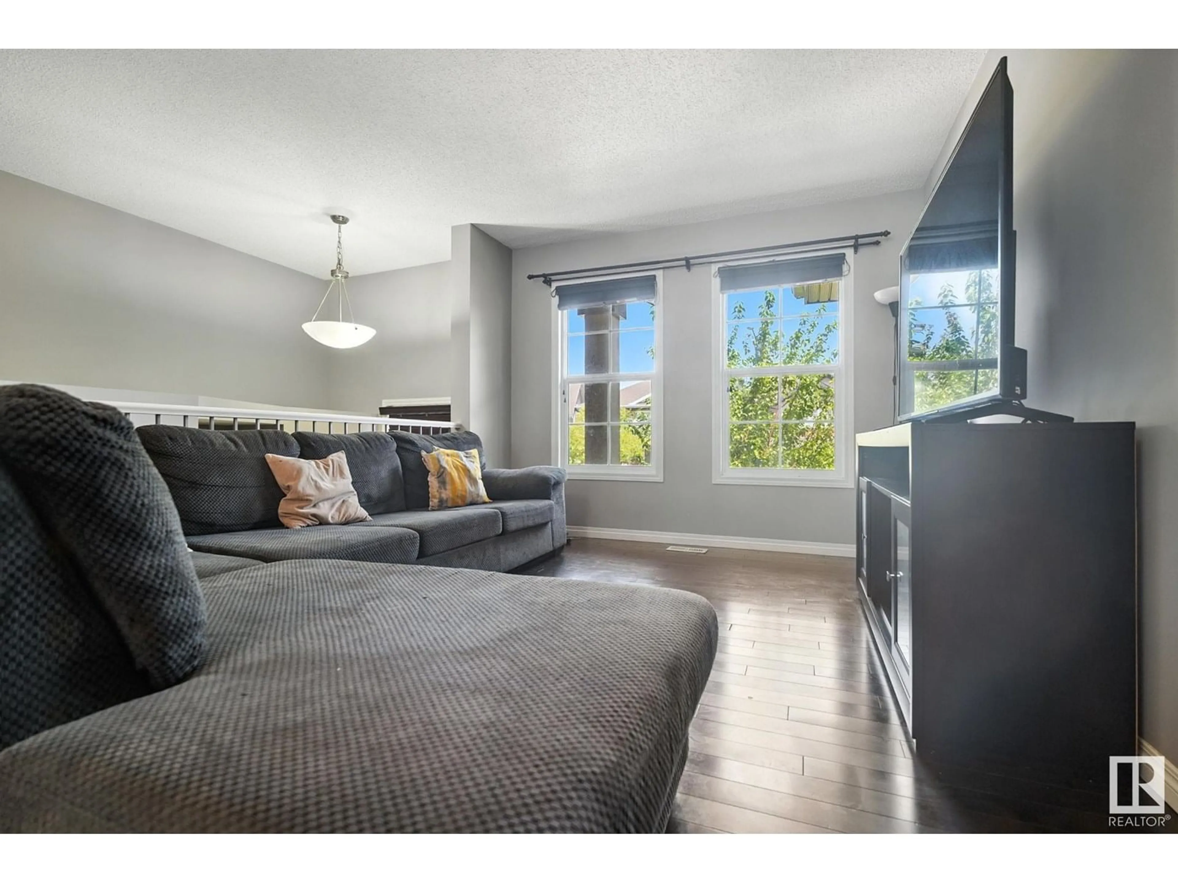 Living room with furniture, unknown for 4033 ORCHARDS DR, Edmonton Alberta T6X1V2