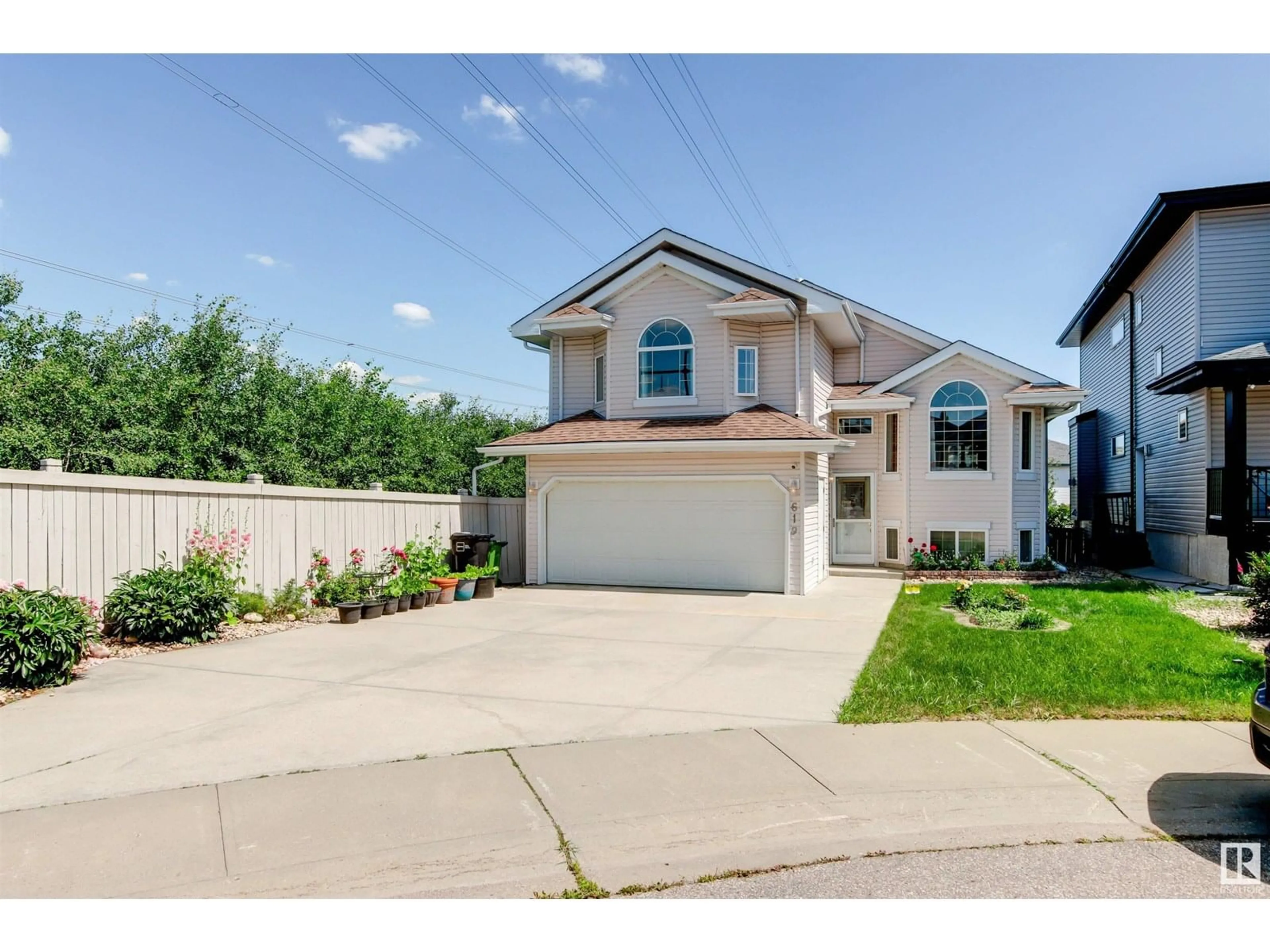 Home with vinyl exterior material, street for 619 LAYTON CO, Edmonton Alberta T6R2S9