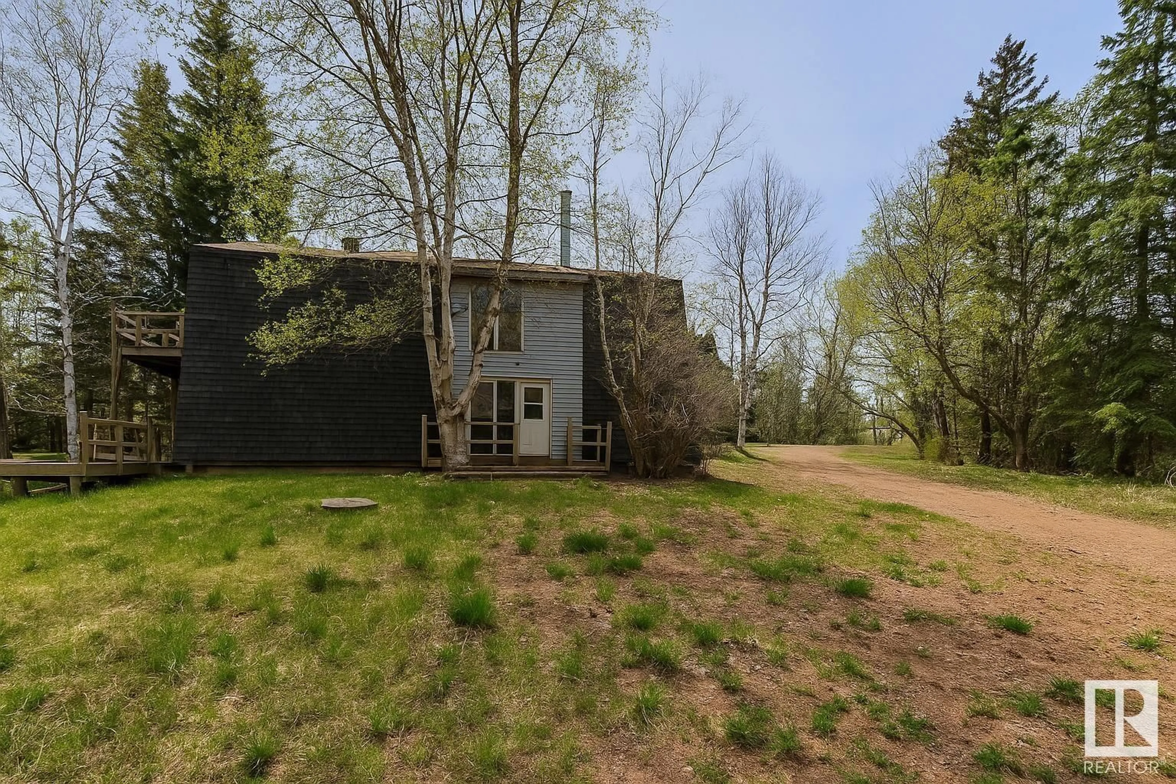 A pic from outside/outdoor area/front of a property/back of a property/a pic from drone, forest/trees view for 60417 - 329 RNG RD, Rural St. Paul County Alberta T0A3E0