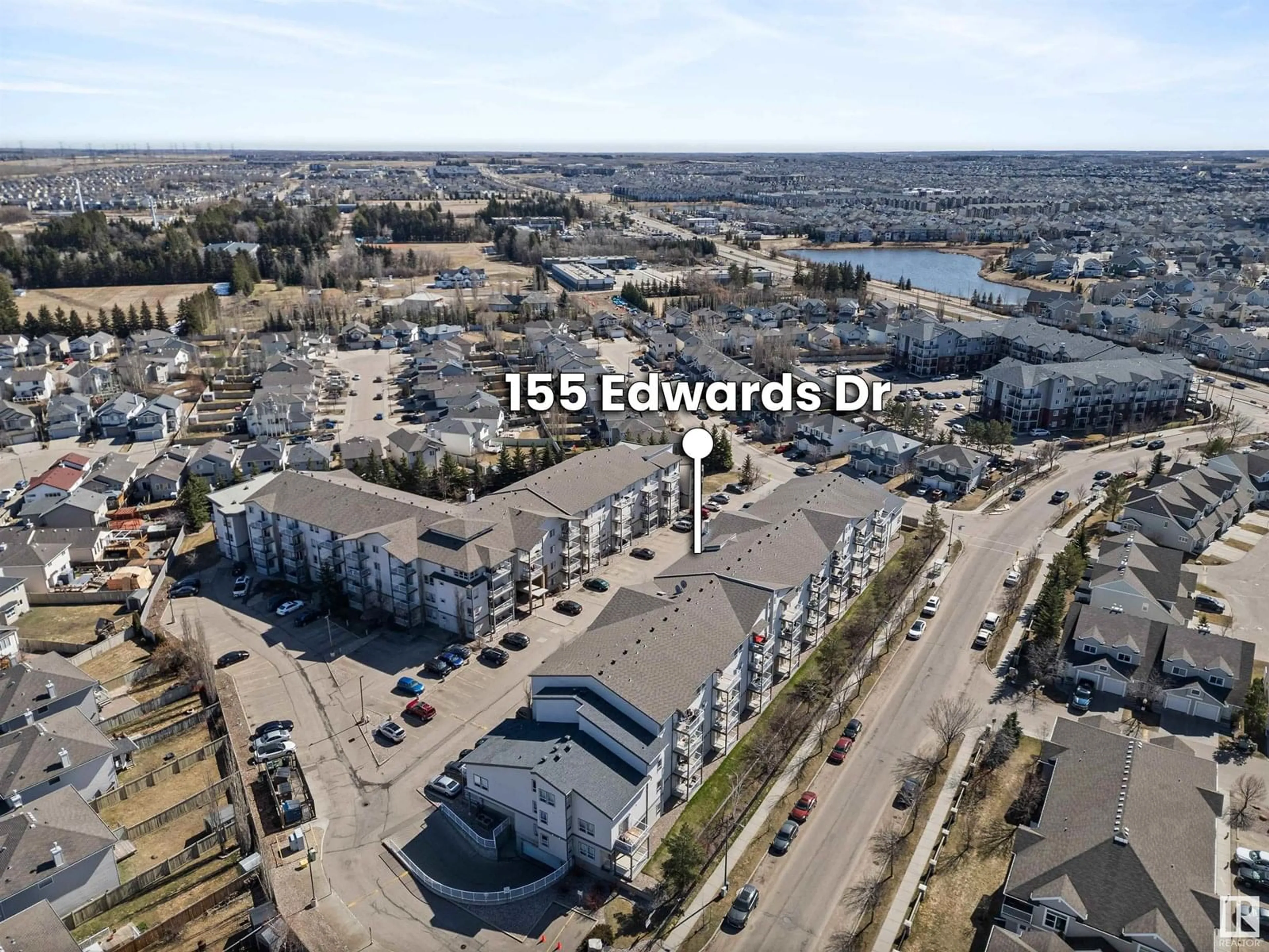 A pic from outside/outdoor area/front of a property/back of a property/a pic from drone, unknown for #209 - 155 EDWARDS DR, Edmonton Alberta T6X1N6