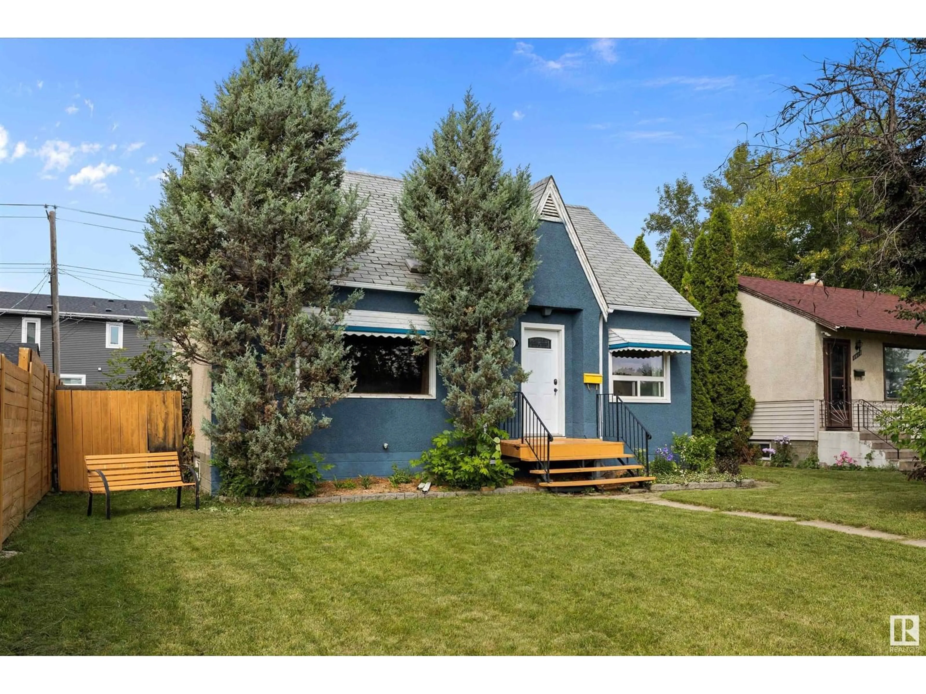 Home with vinyl exterior material, street for 8006 75 ST, Edmonton Alberta T6C2G7
