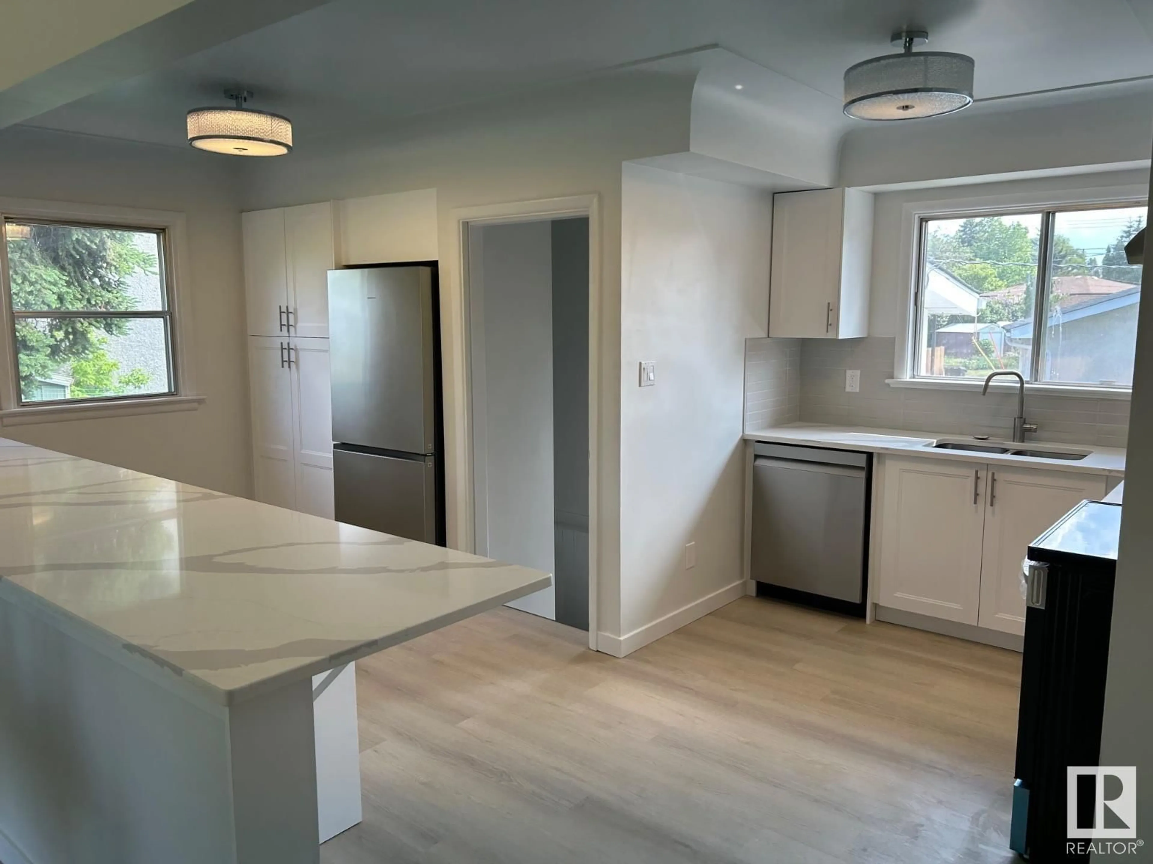 Open concept kitchen, unknown for 14 O'BRIEN DR, Fort Saskatchewan Alberta T8L2L3